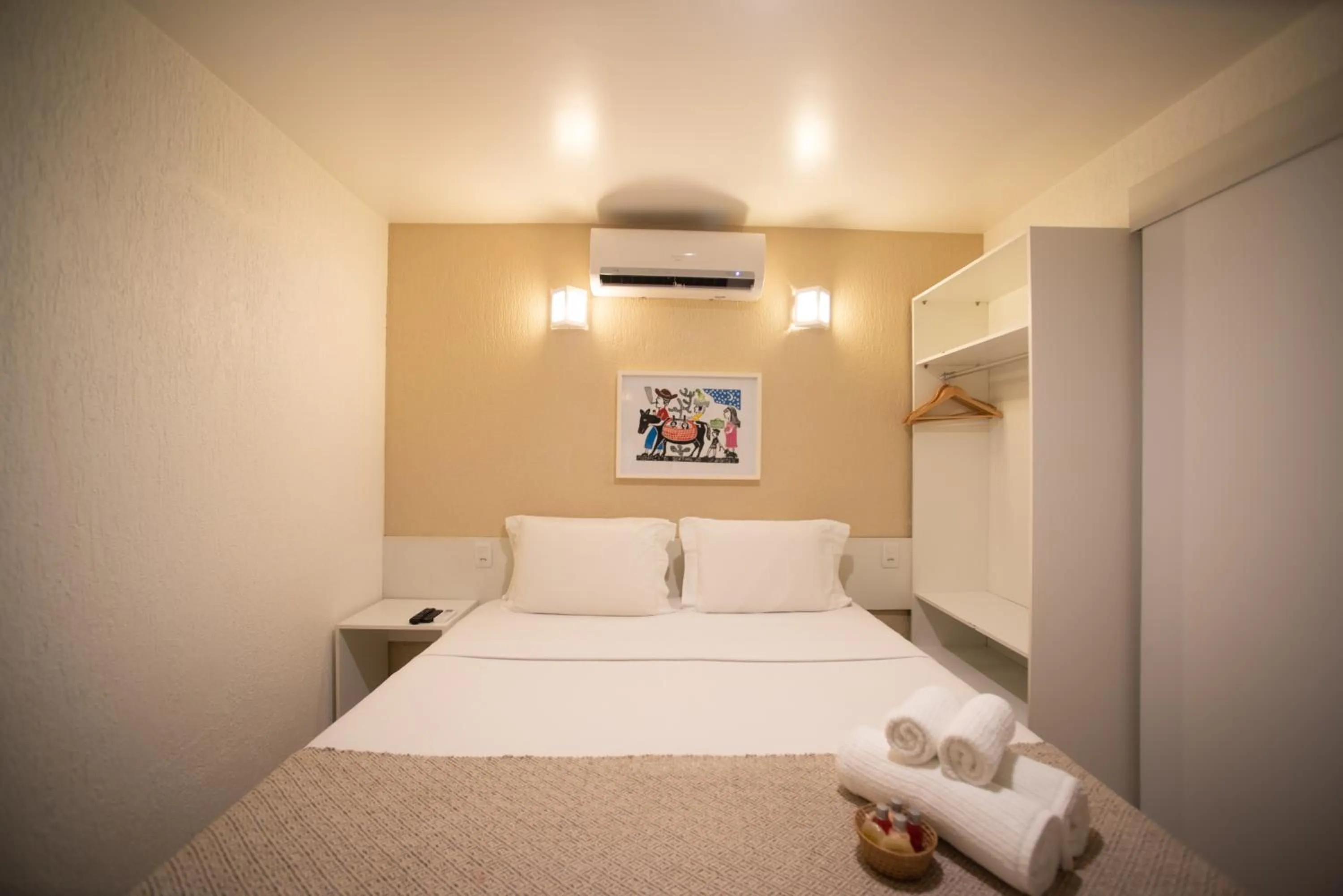 Bed in Pousada Malibu