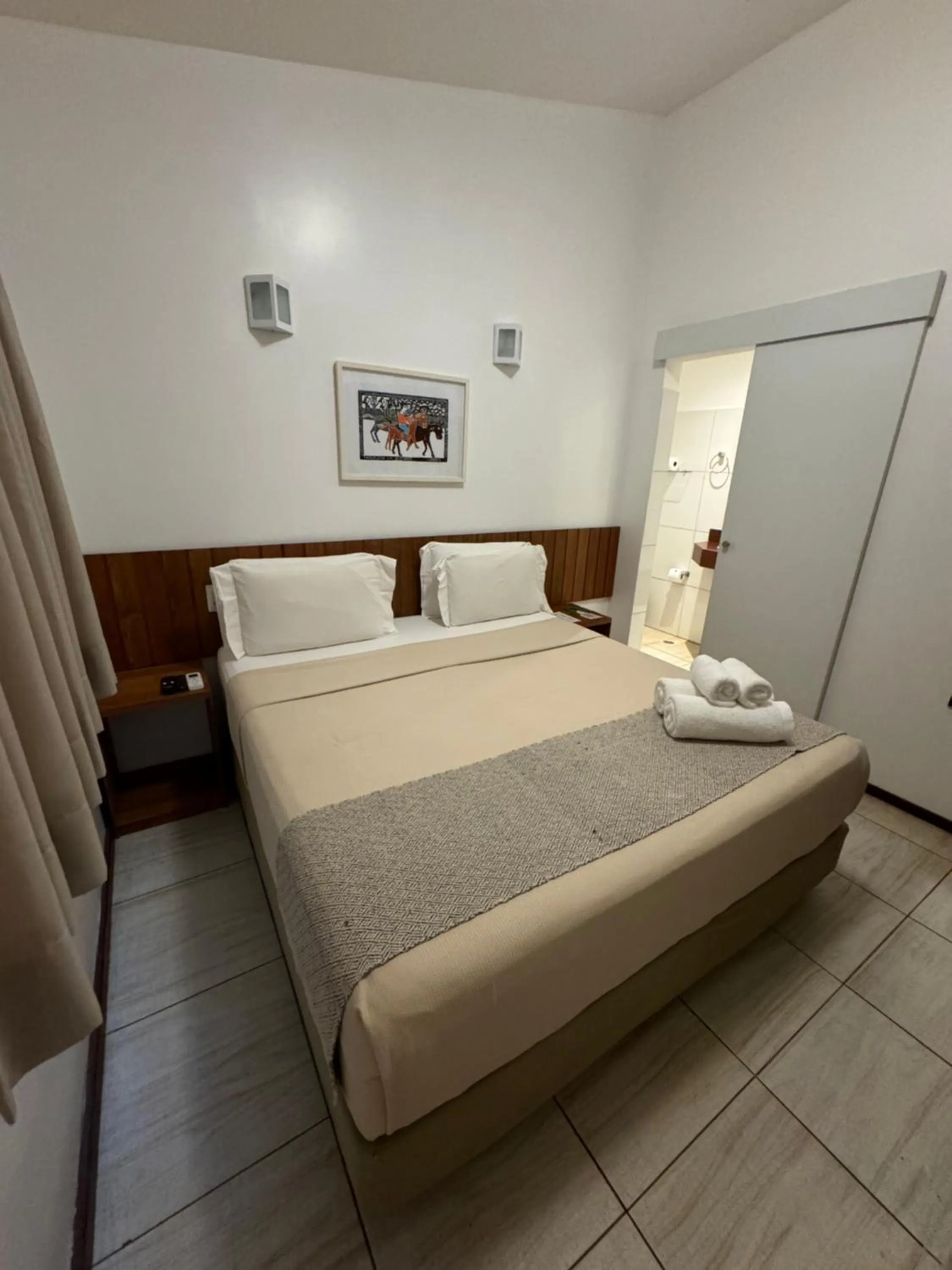 Bed in Pousada Malibu