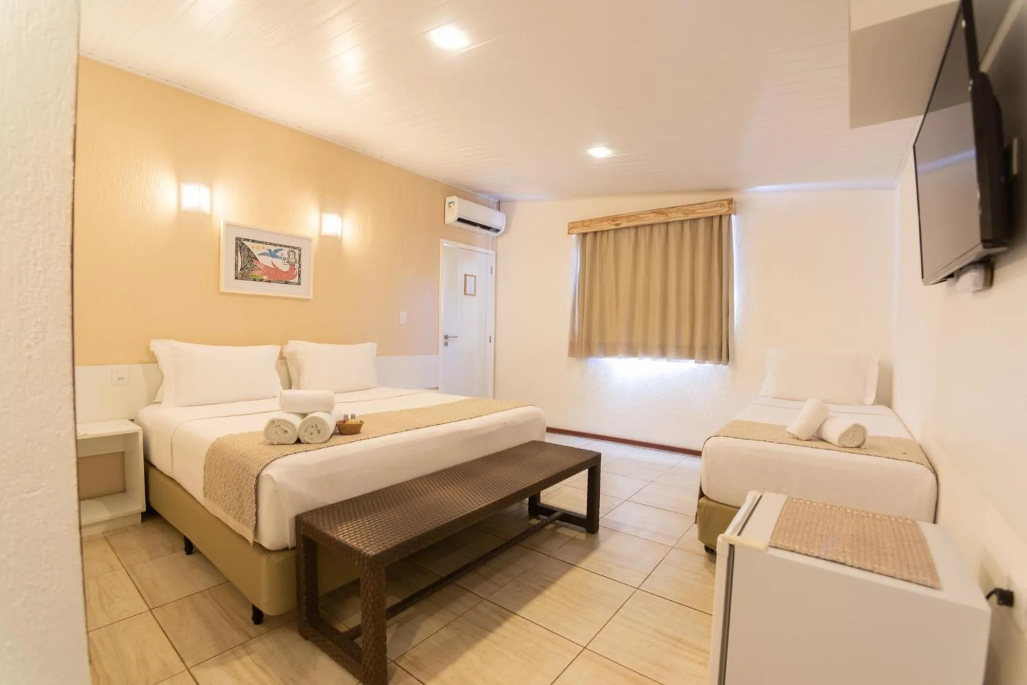 Bed in Pousada Malibu