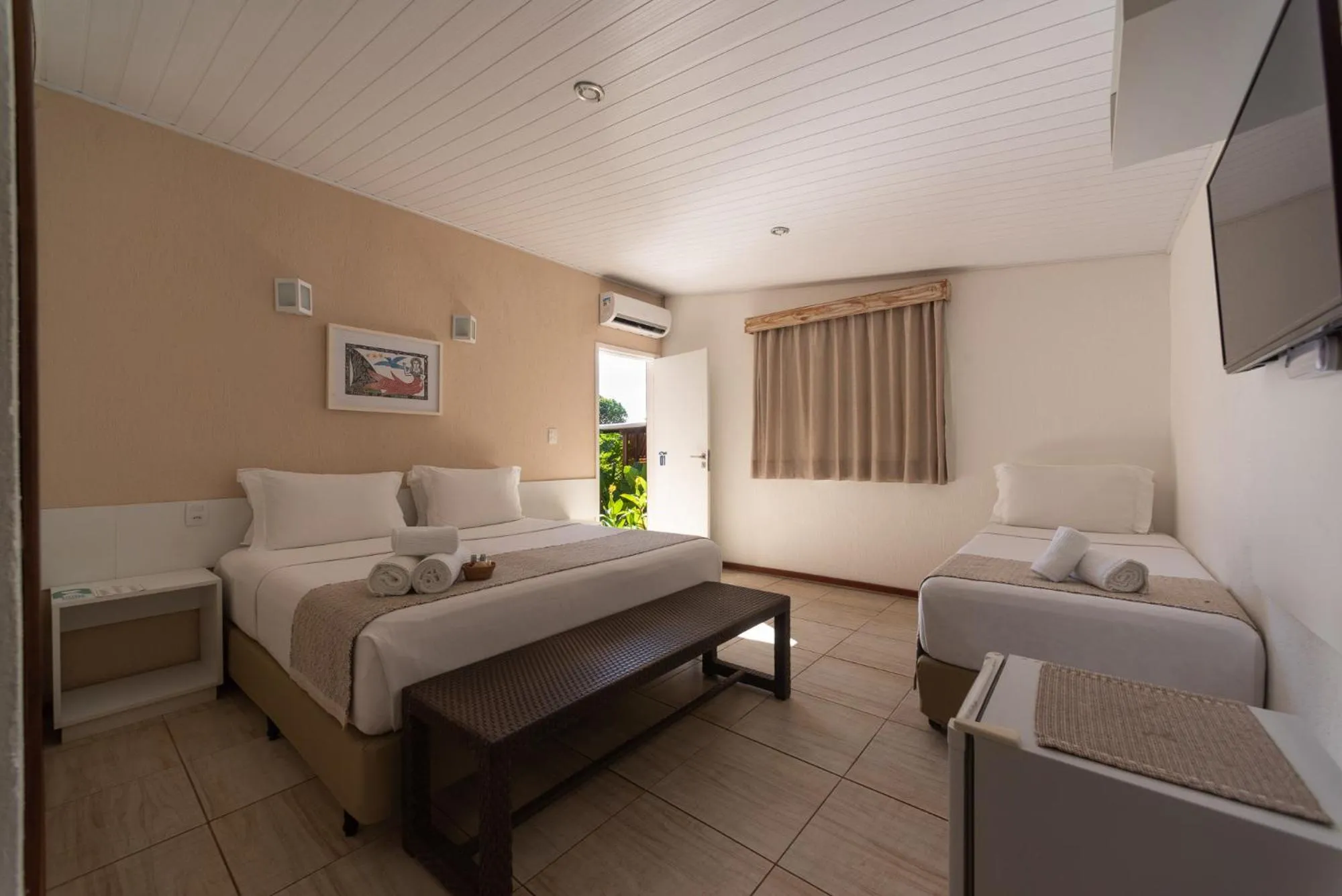 Bed in Pousada Malibu