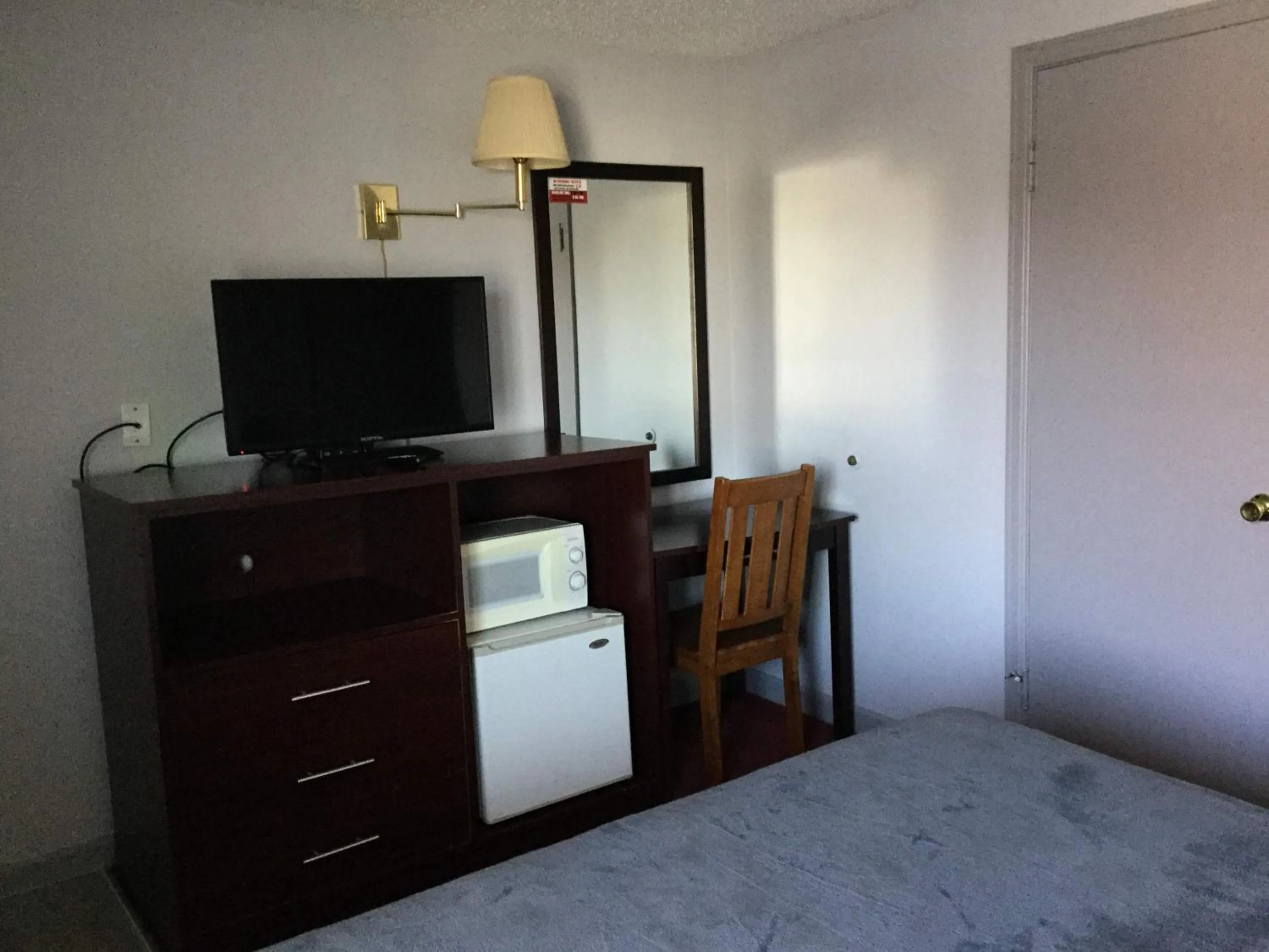 Bed in Swiss Cottage Inn