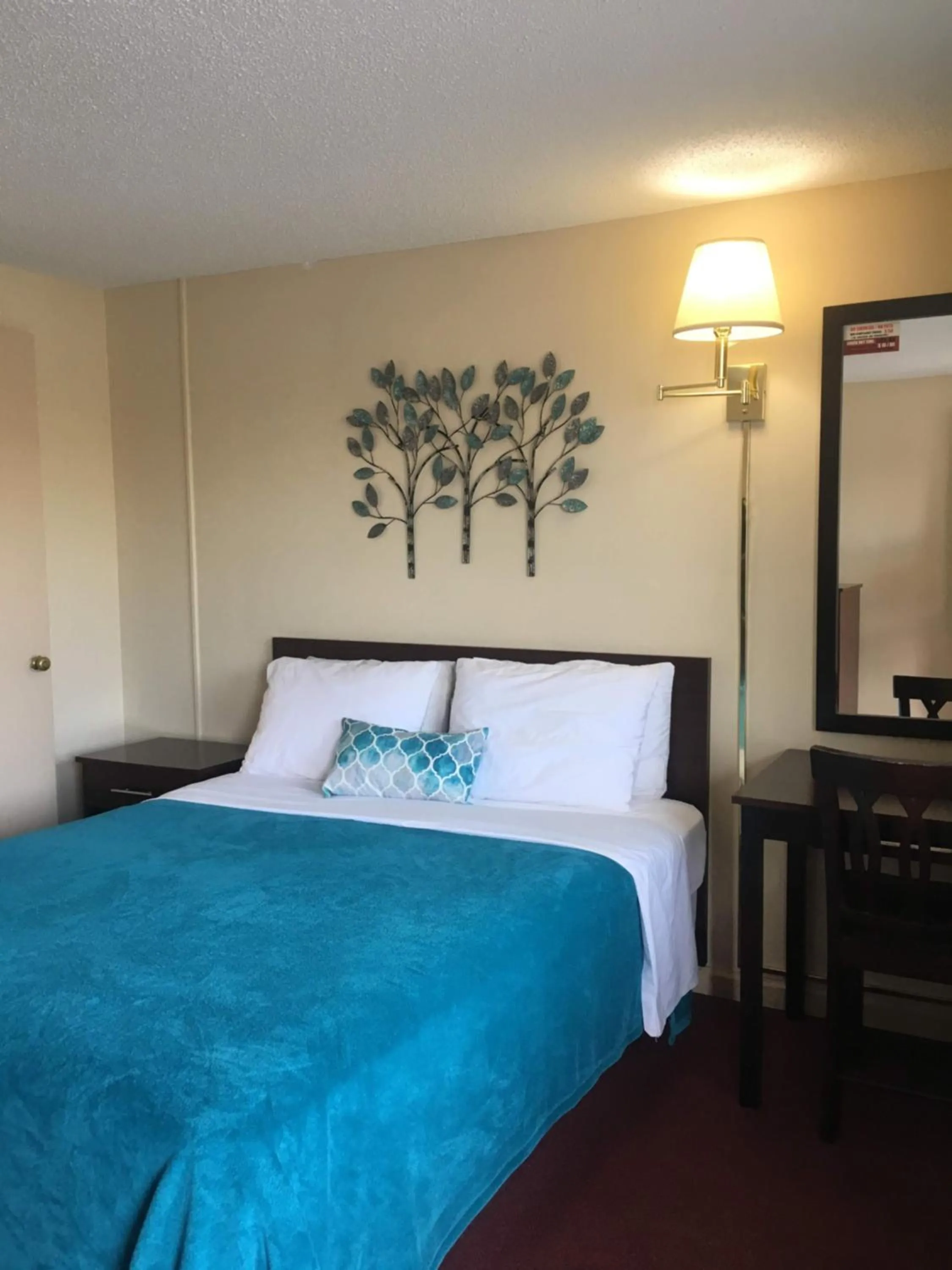 Bed in Swiss Cottage Inn