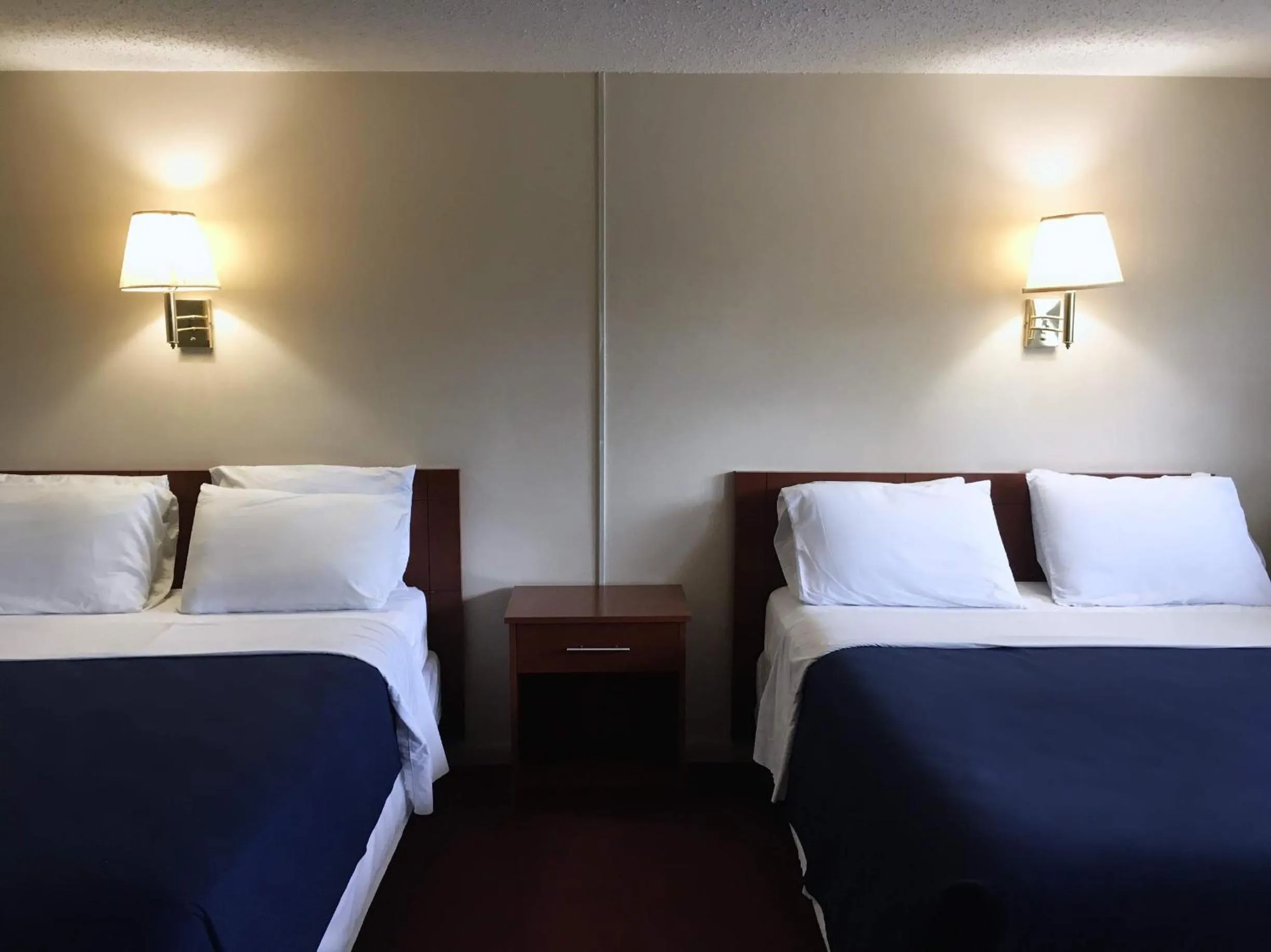 Bed in Swiss Cottage Inn