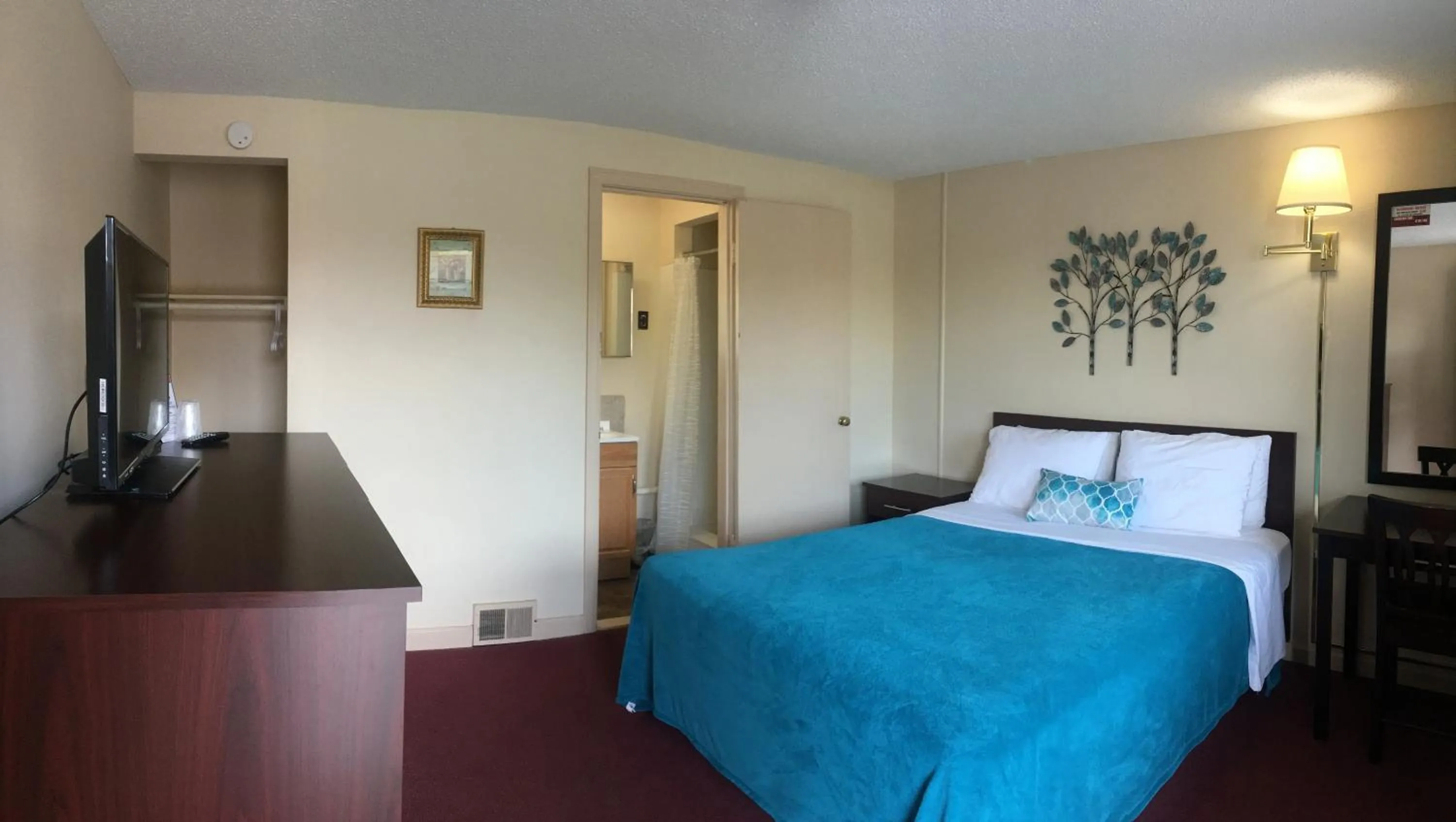 Bed in Swiss Cottage Inn