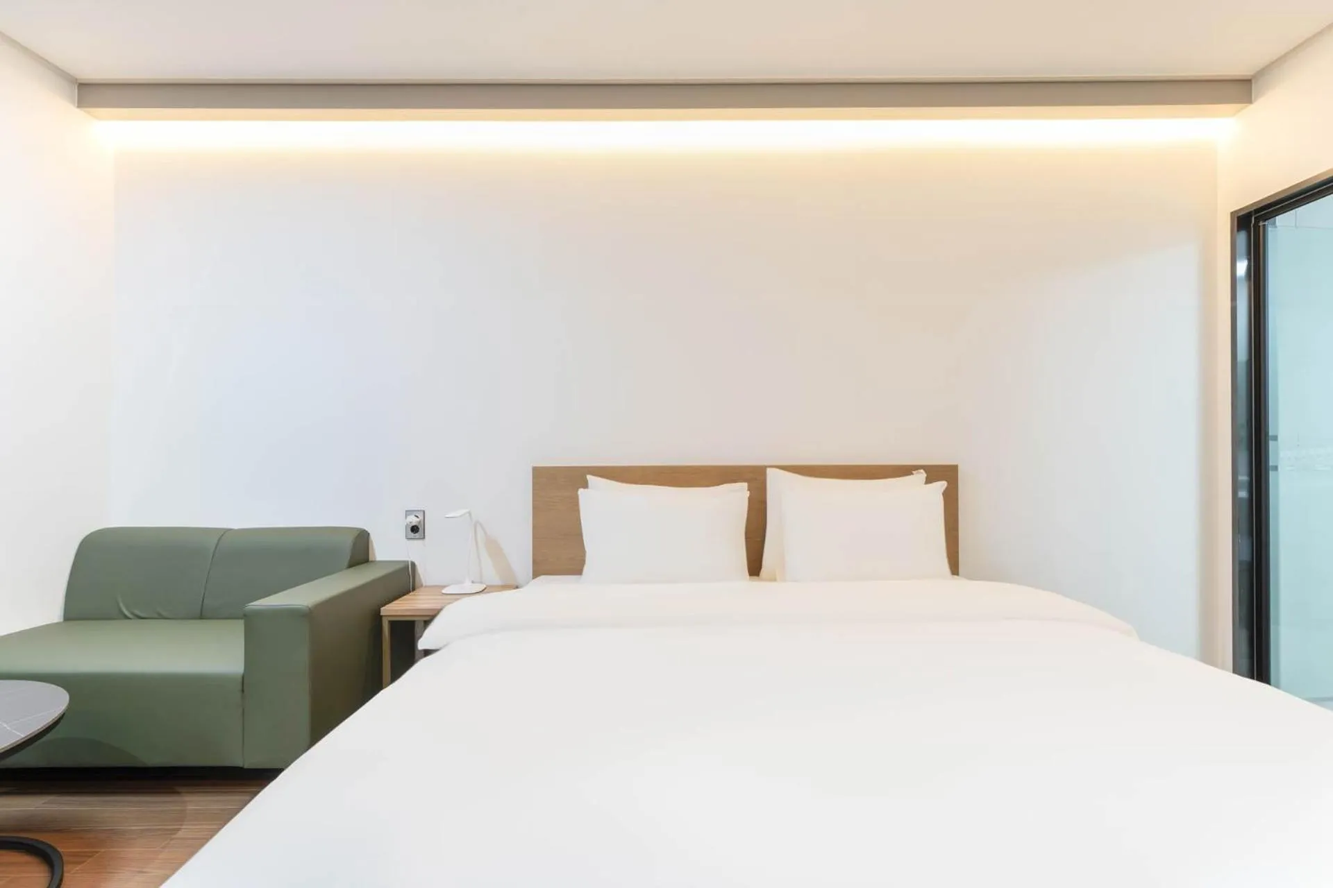 Bed in Hotel Deokyeong