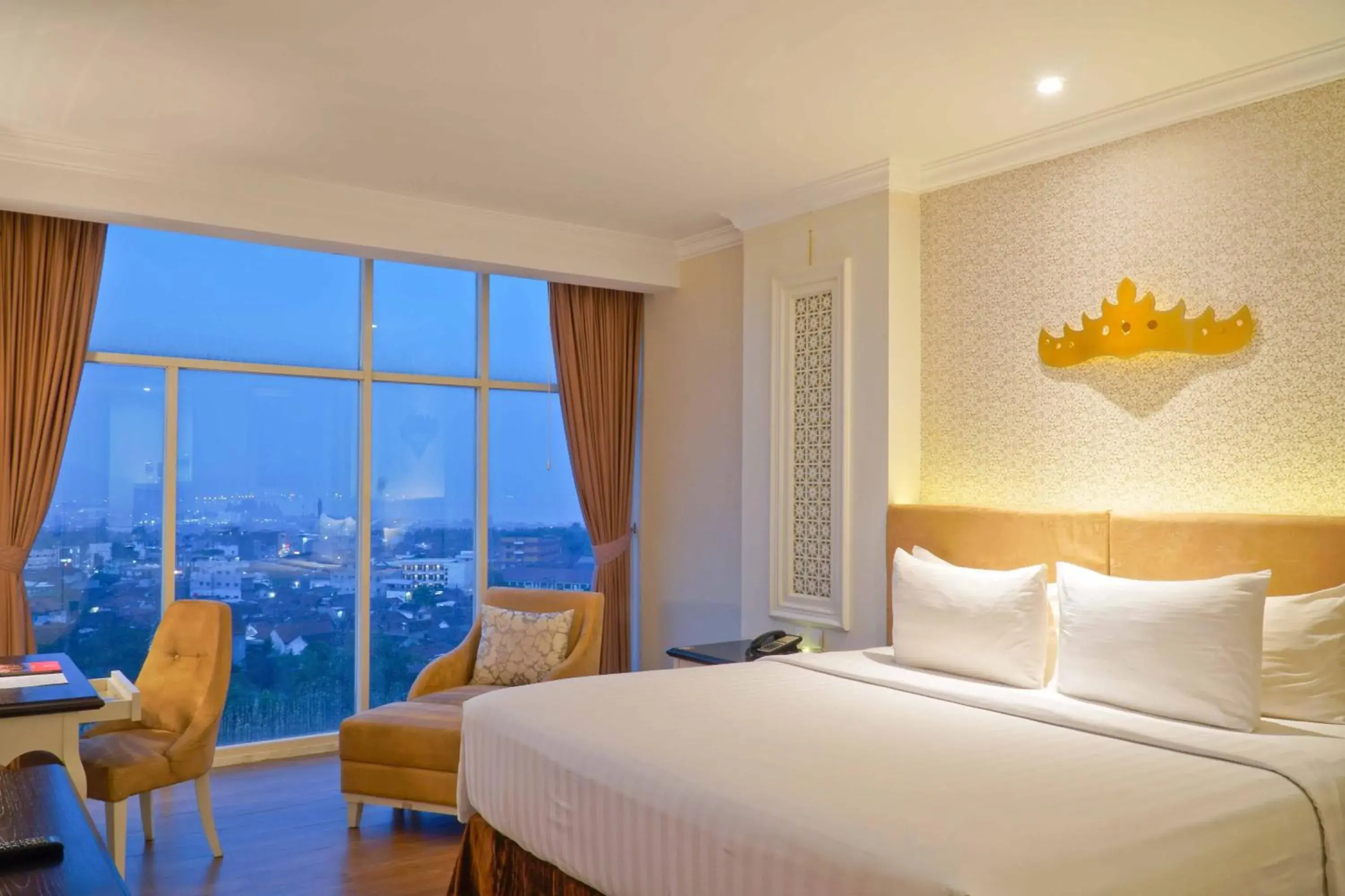 Deluxe King Room with Pool View in Swiss-Belhotel Lampung Deluxe King Room with Pool View in Swiss-Belhotel Lampung