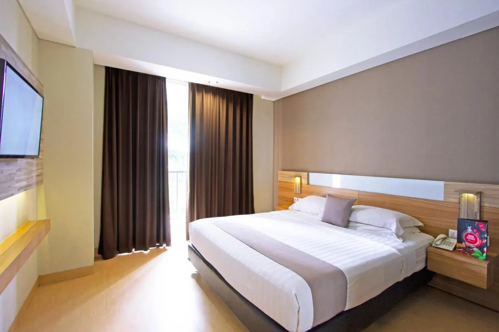 Bed in Hotel Dafam Fortuna Seturan