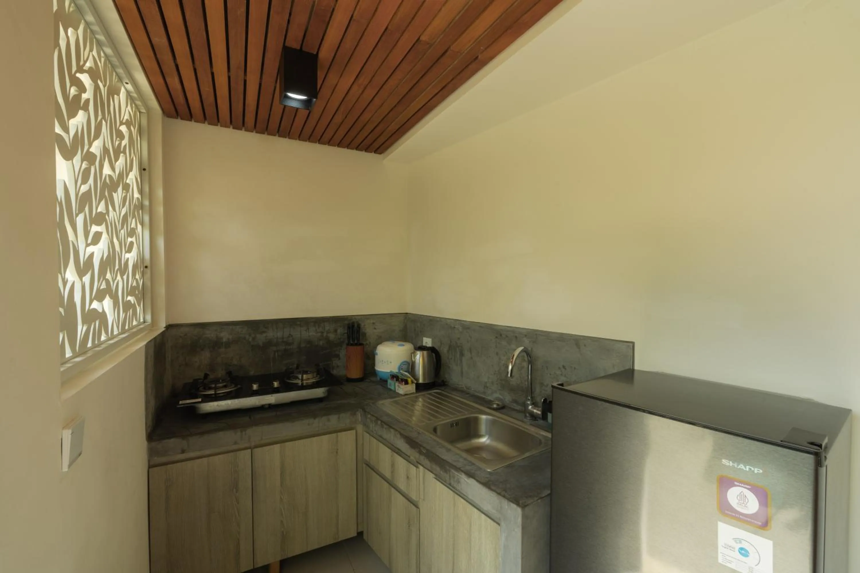 Kitchen or kitchenette in Odika Lovina Villas