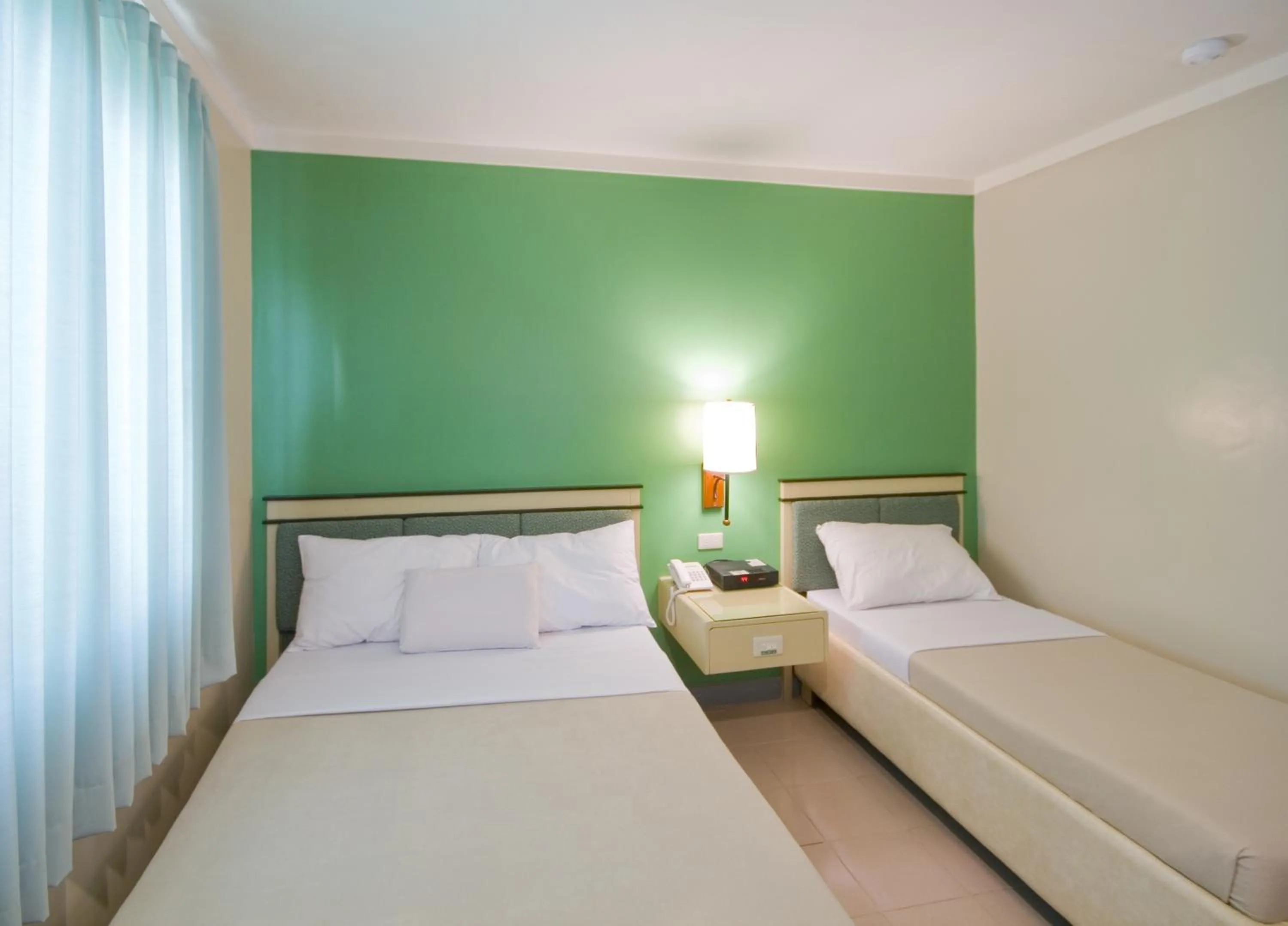 Bed in New Dawn Pensionne House