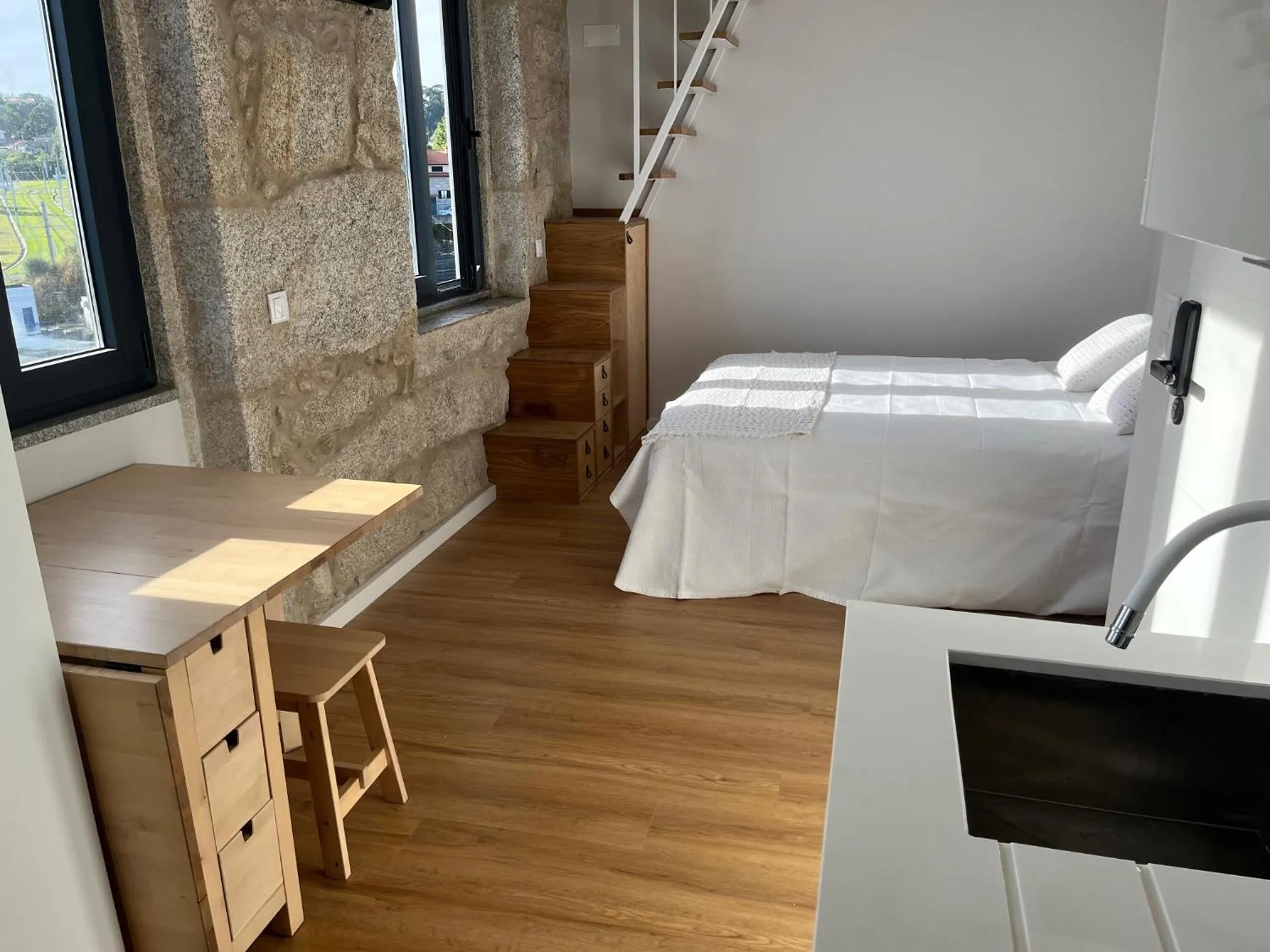 Bed in Ameixial Suites