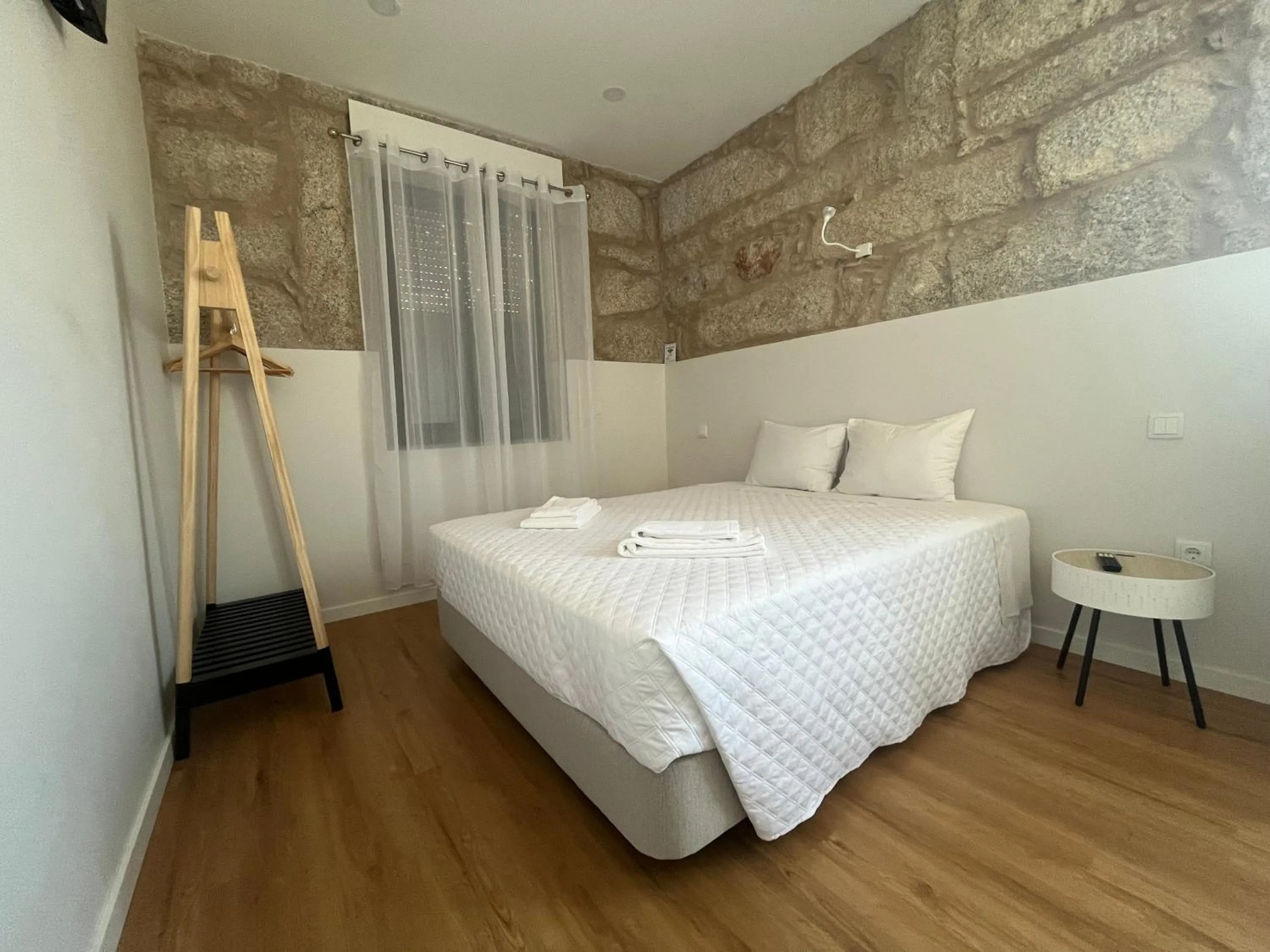 Bed in Ameixial Suites