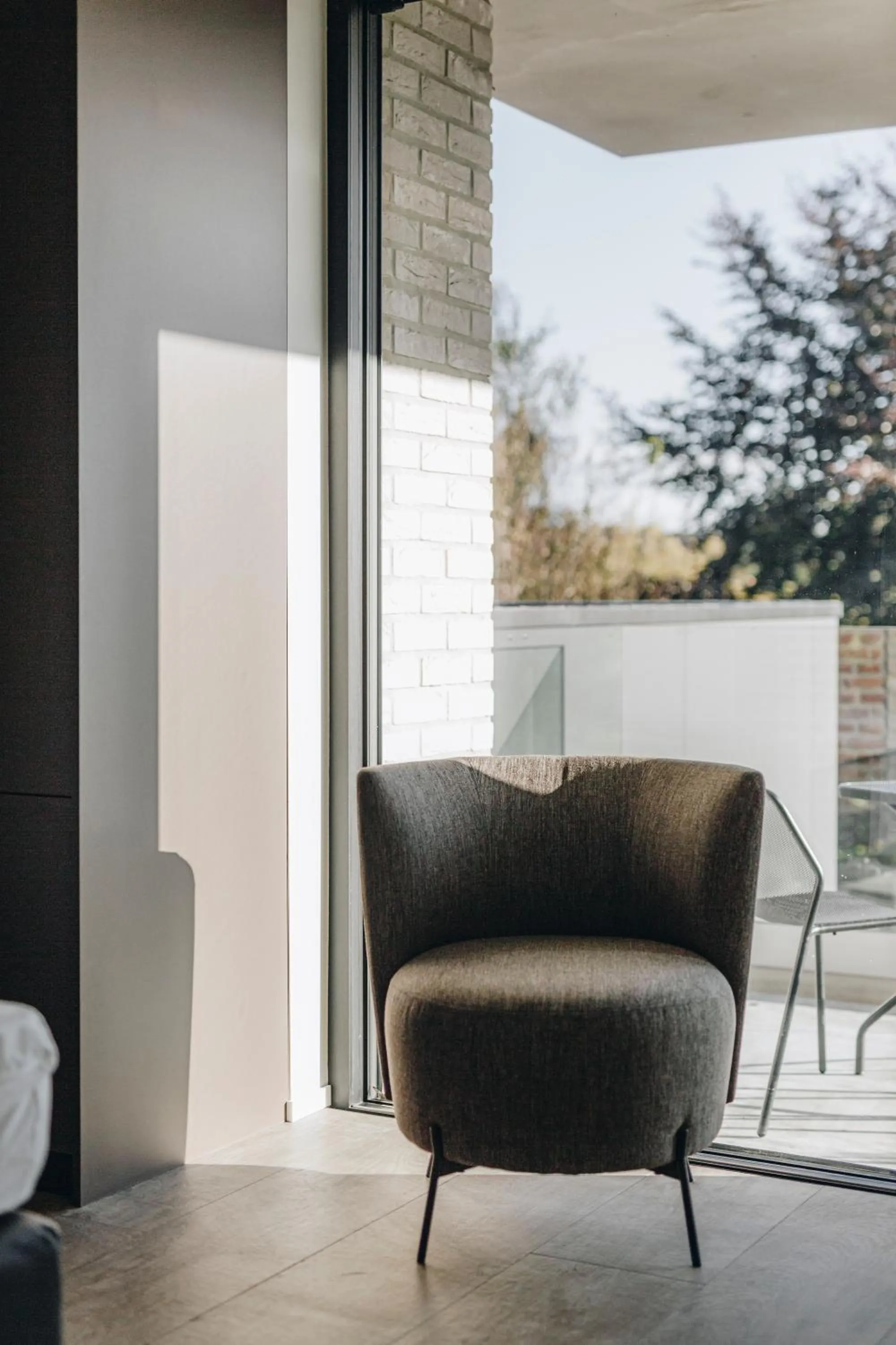 Seating area in CC Nomie Hôtel Restaurant