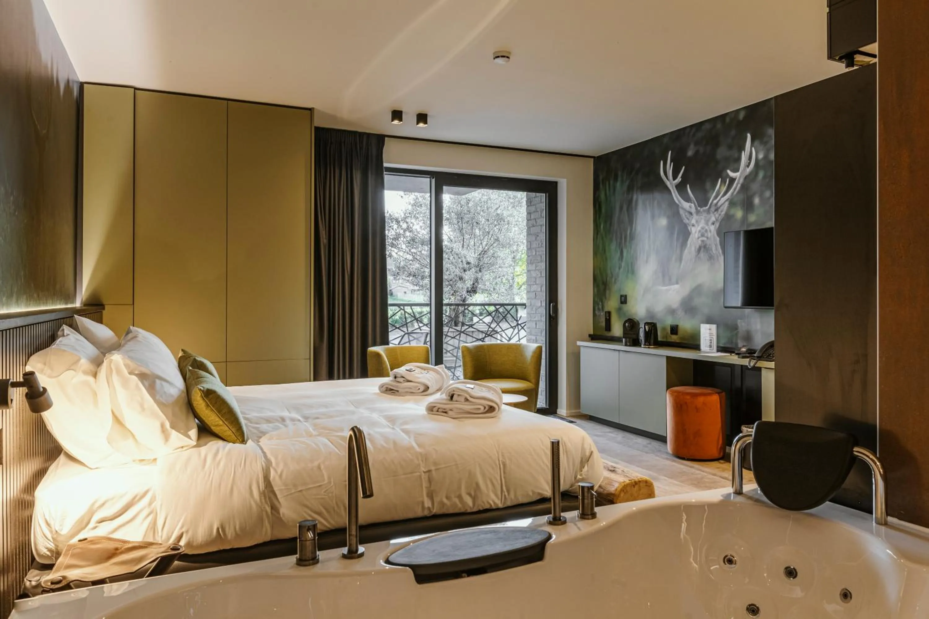 Bed in CC Nomie Hôtel Restaurant