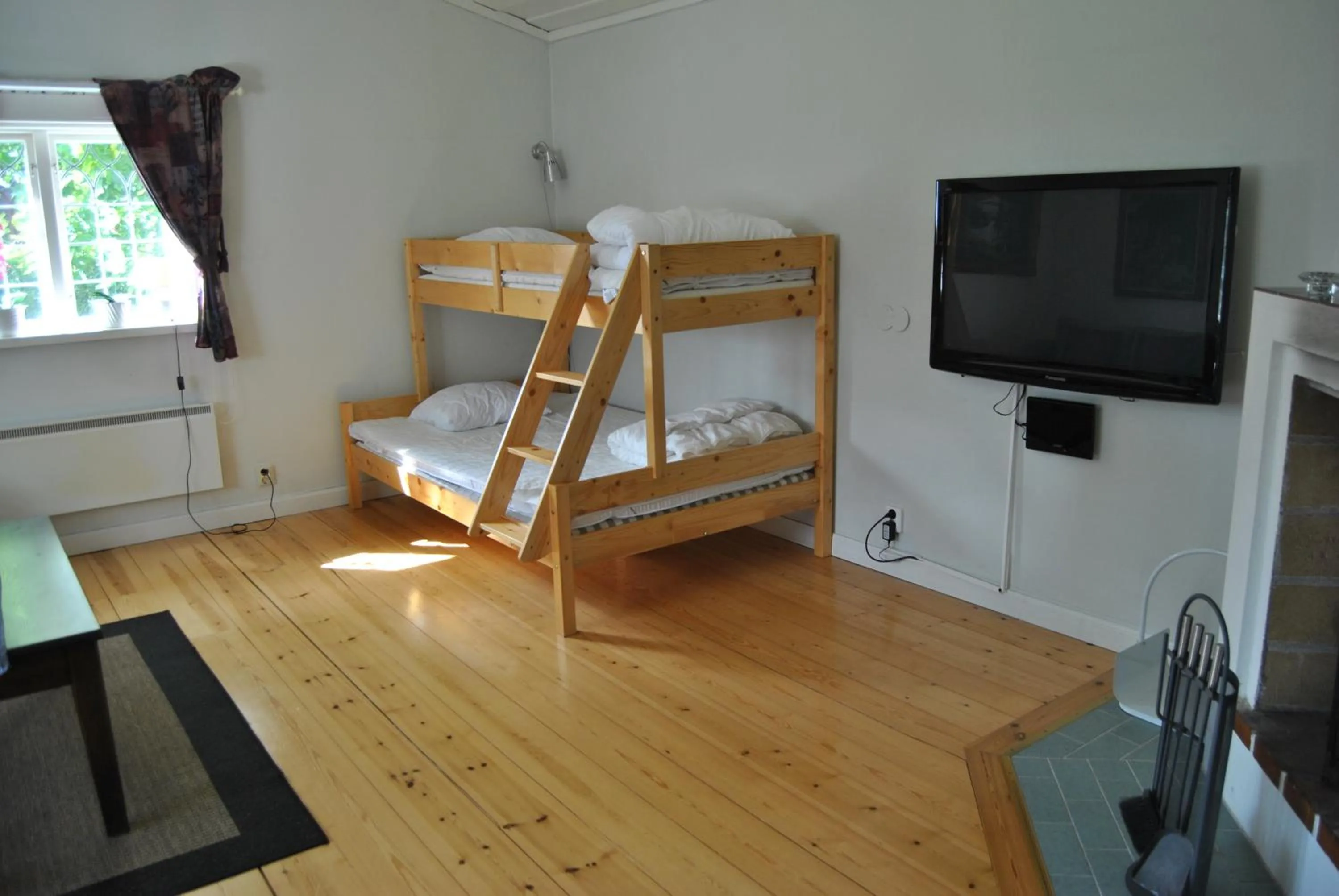 Living room, Bed in Orsastuguthyrning-Hansjö