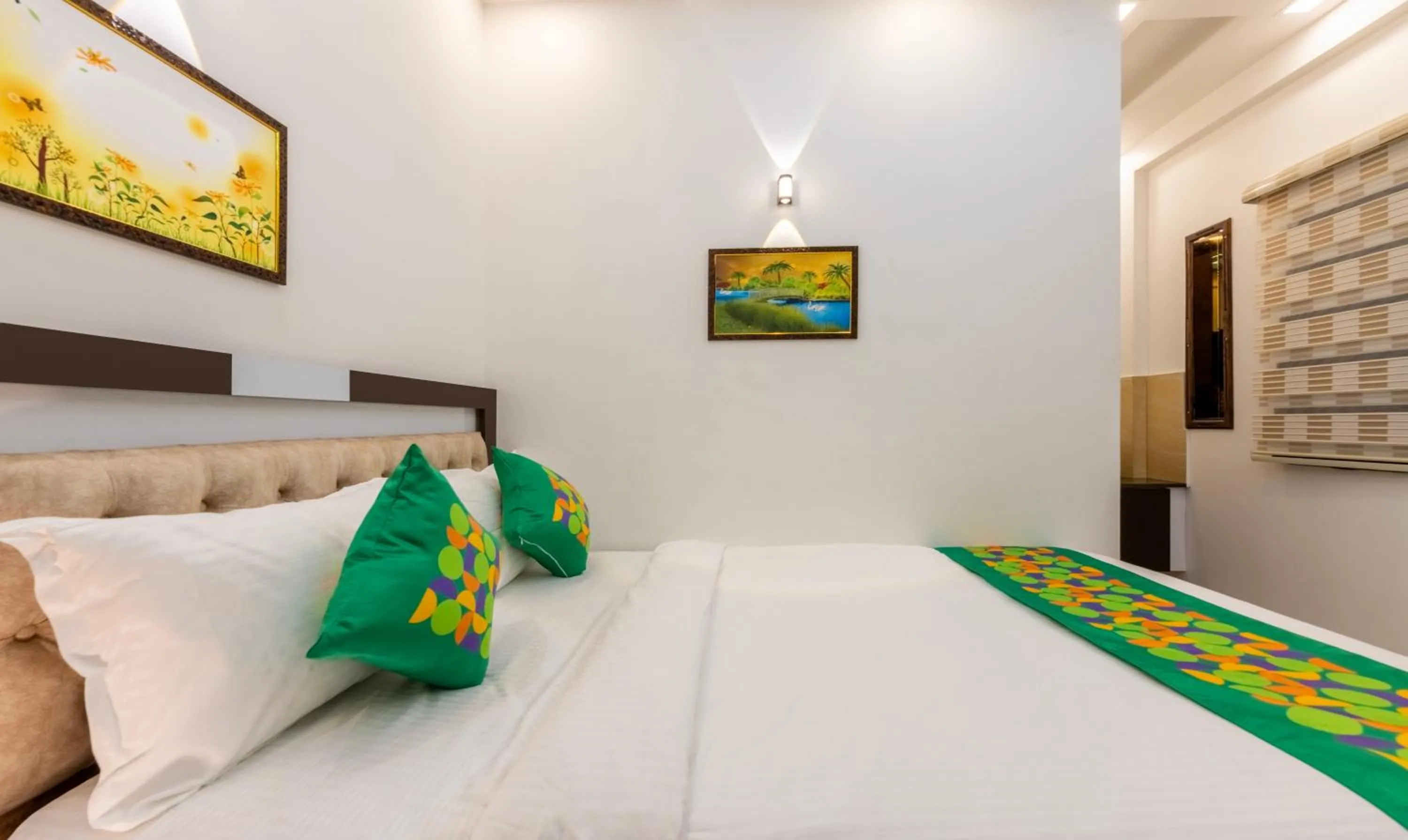 Bedroom, Bed in Treebo Premium Cochin Airport, 5 min From Cochin Airport