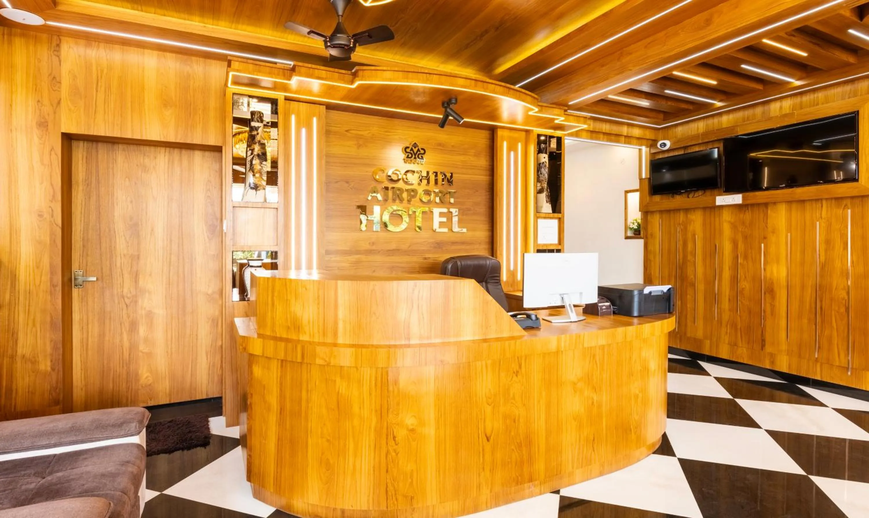 Lobby or reception in Treebo Premium Cochin Airport, 5 min From Cochin Airport