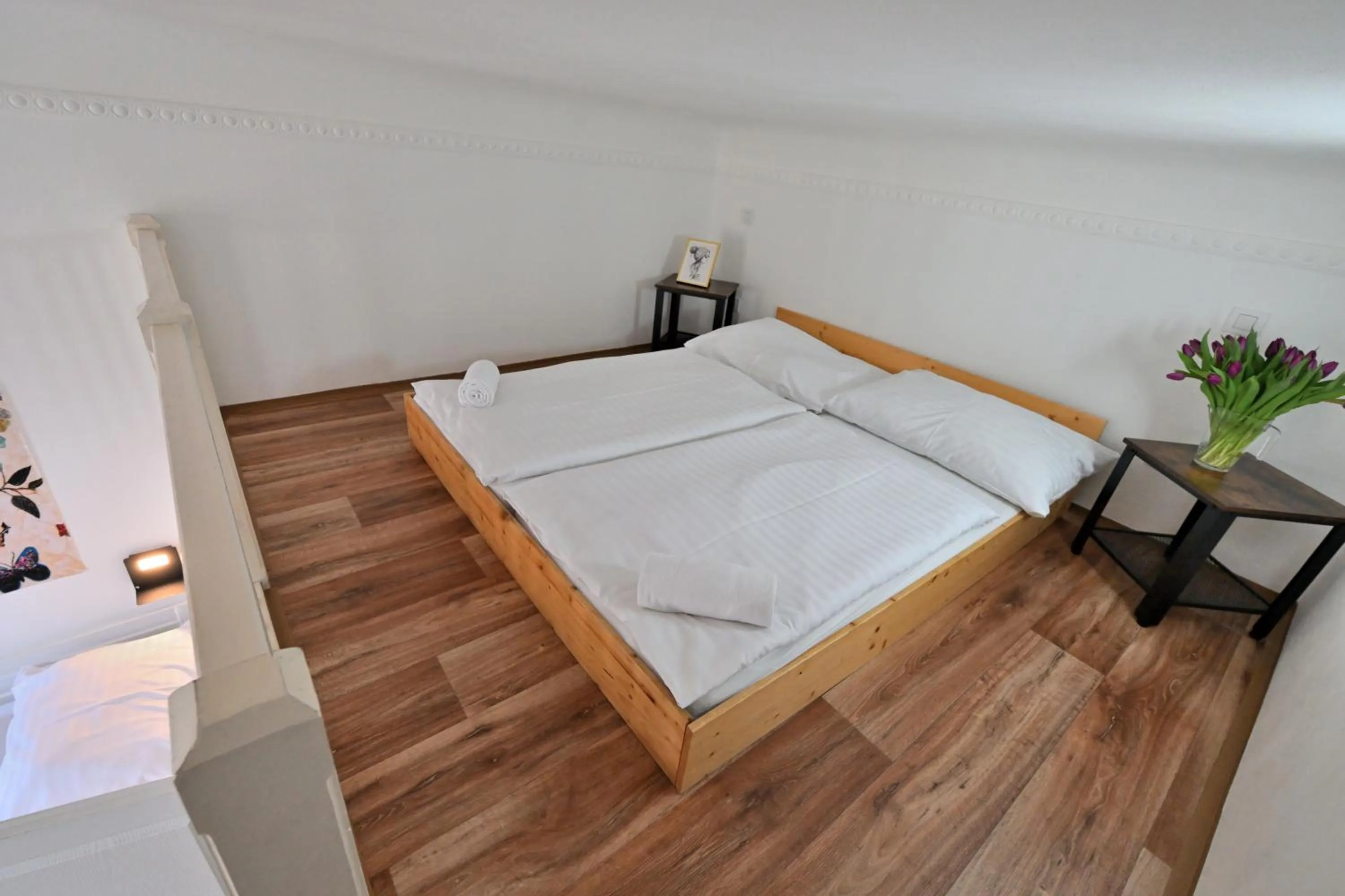 Bed in Hybernska Apartments by Pragueforyou