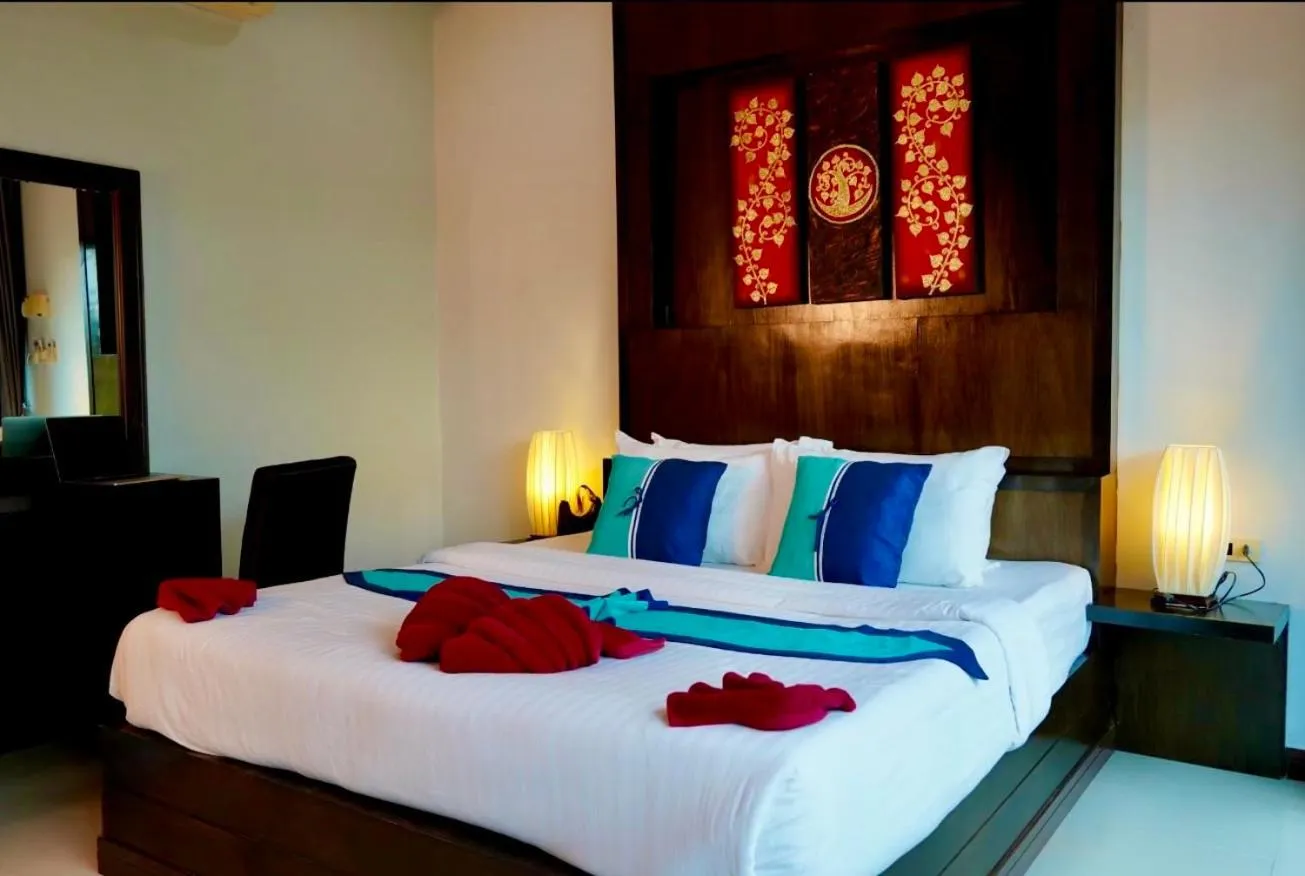 Bed in Kathalee Beach Resort