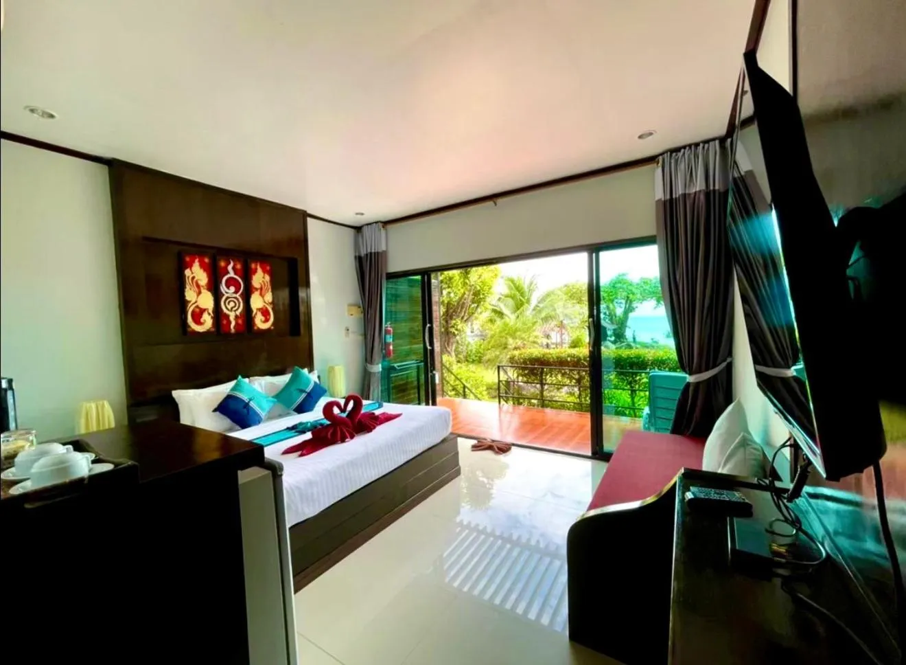 Photo of the whole room, Bed in Kathalee Beach Resort