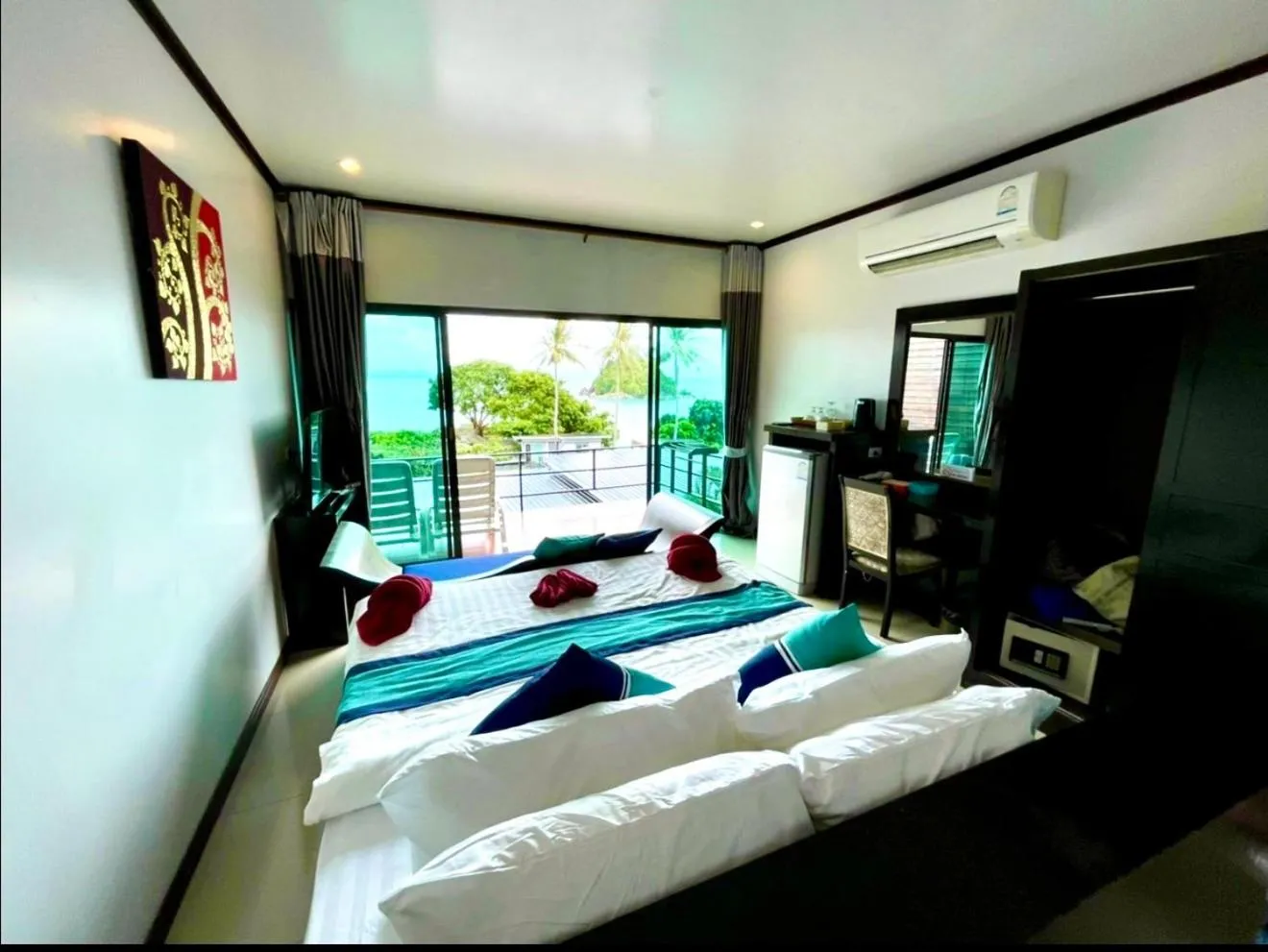 Bed in Kathalee Beach Resort
