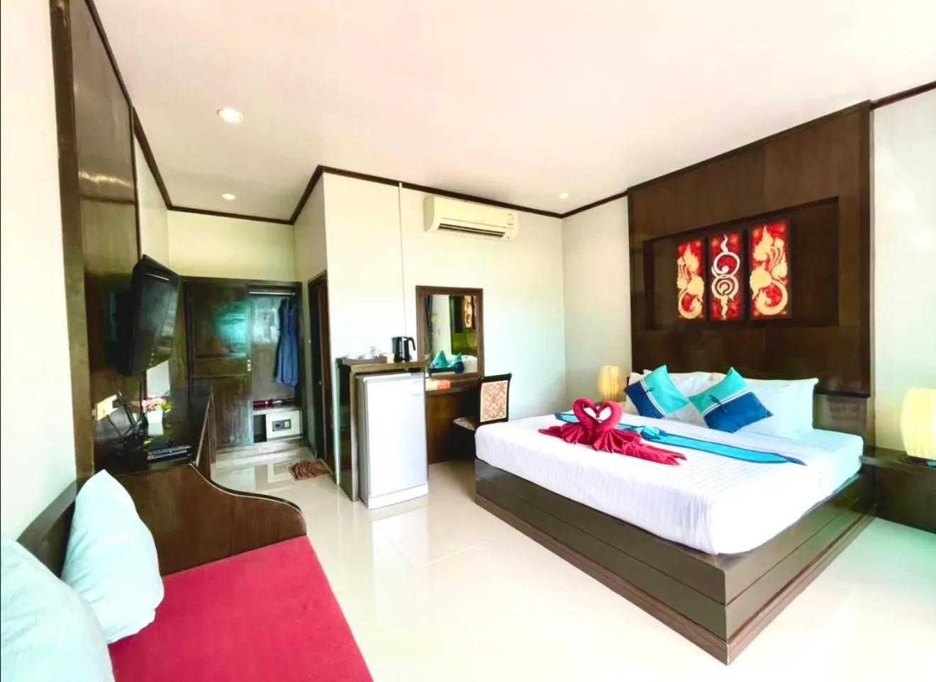Bed in Kathalee Beach Resort