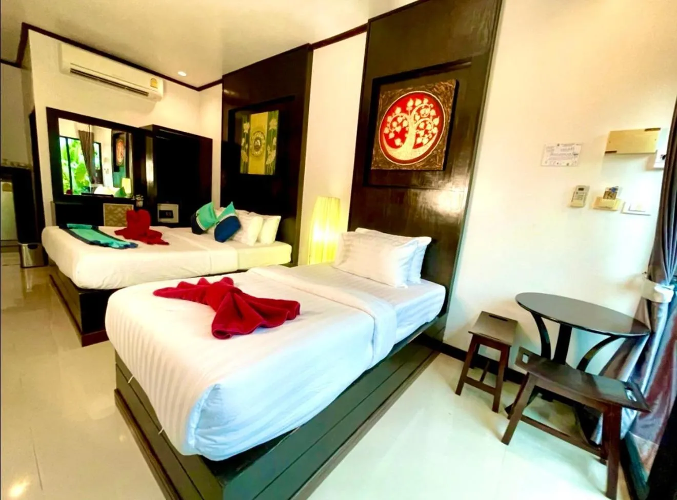 Bed in Kathalee Beach Resort