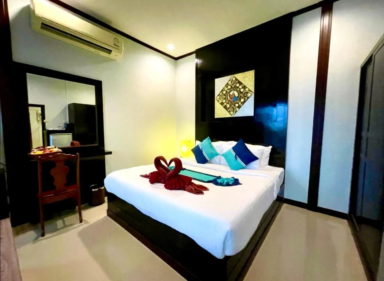 Bed in Kathalee Beach Resort