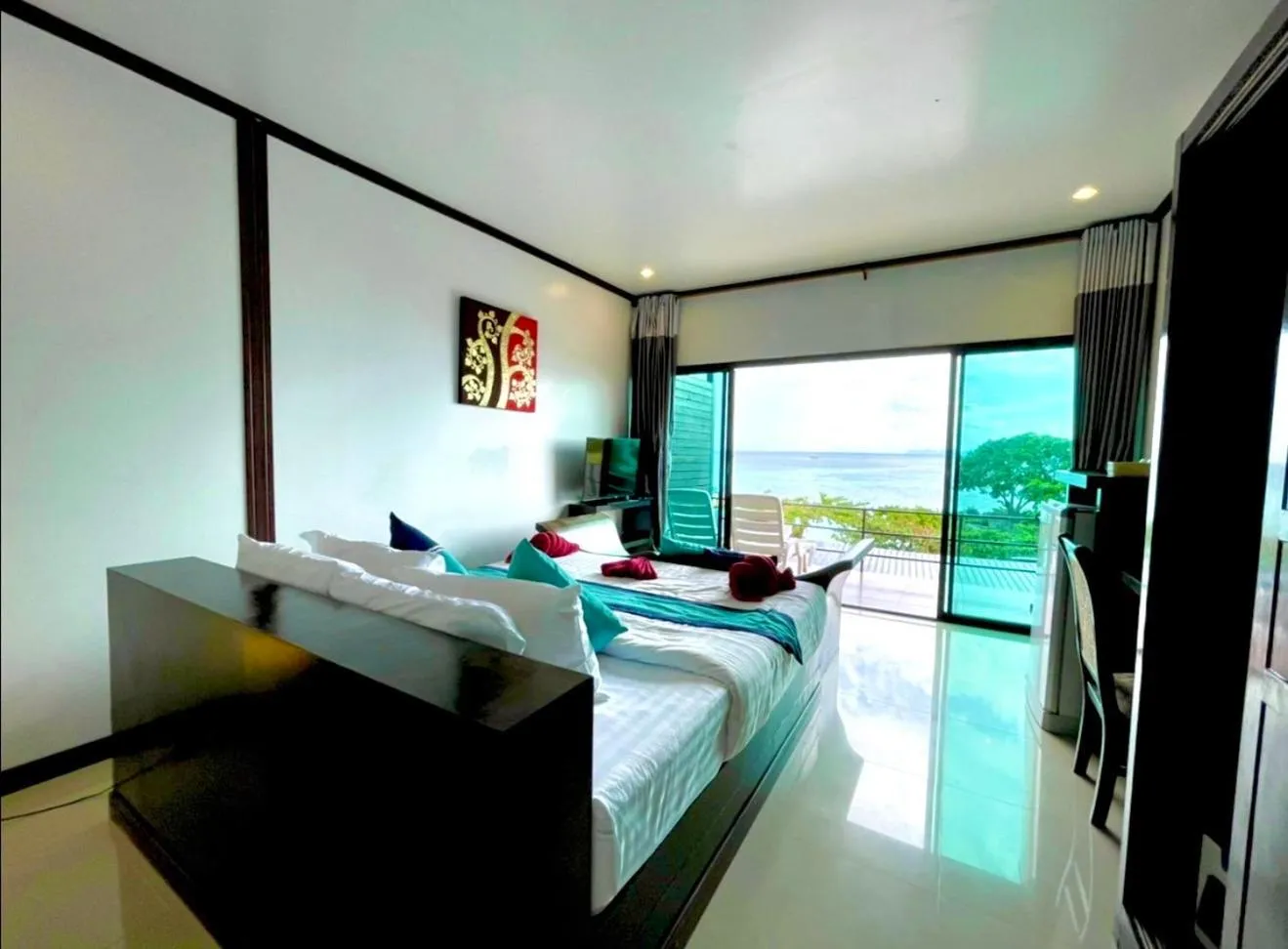 Bed in Kathalee Beach Resort