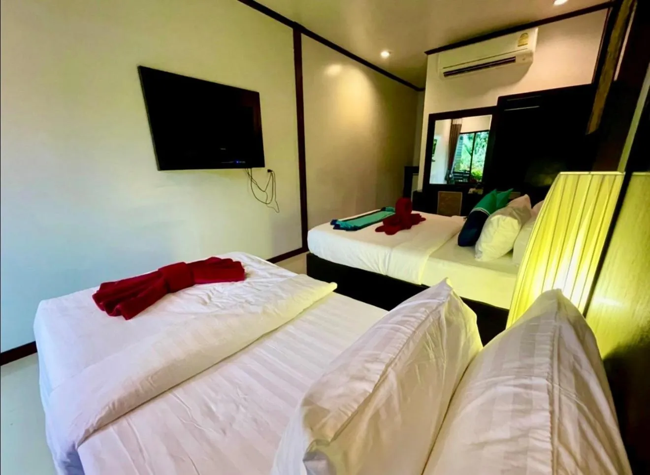 Bed in Kathalee Beach Resort