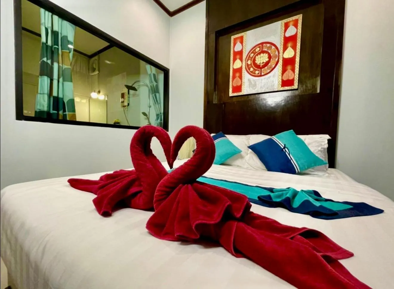 Bed in Kathalee Beach Resort