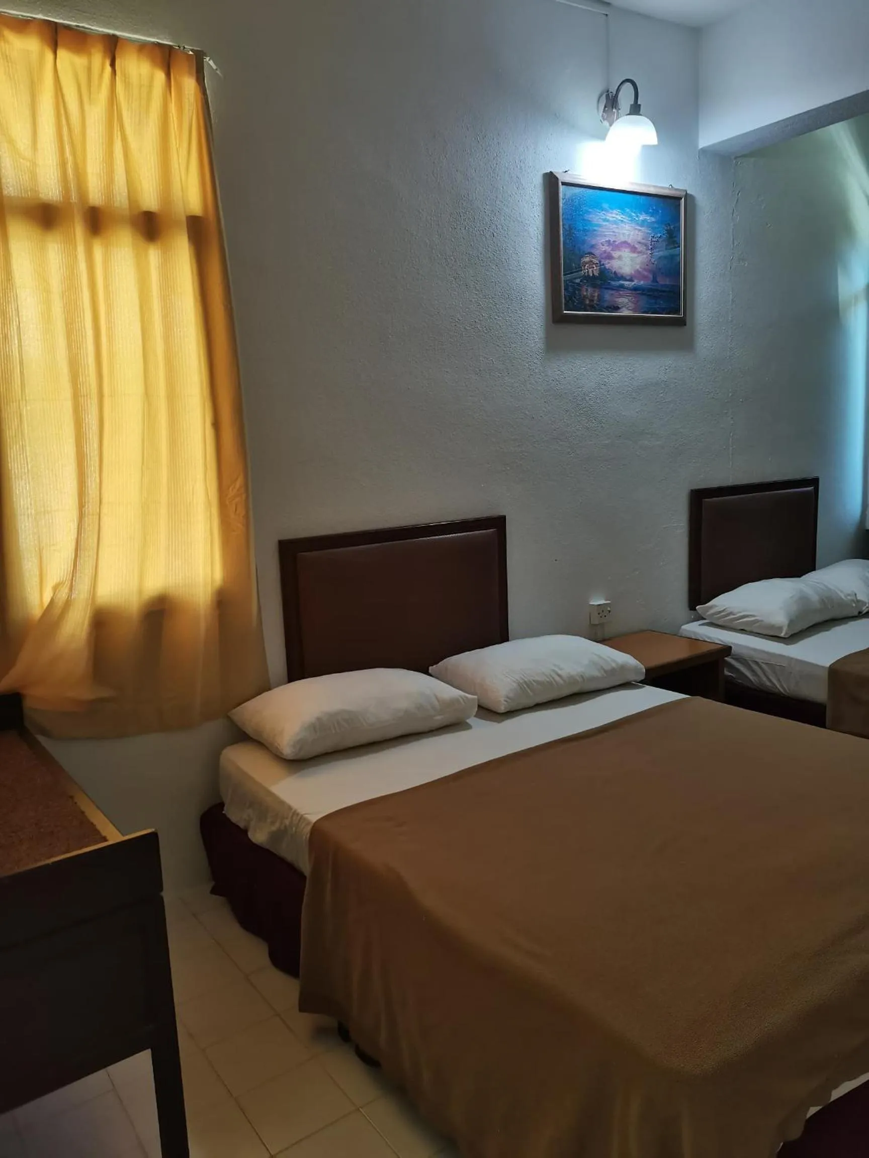 Bed in Grand Star Hotel