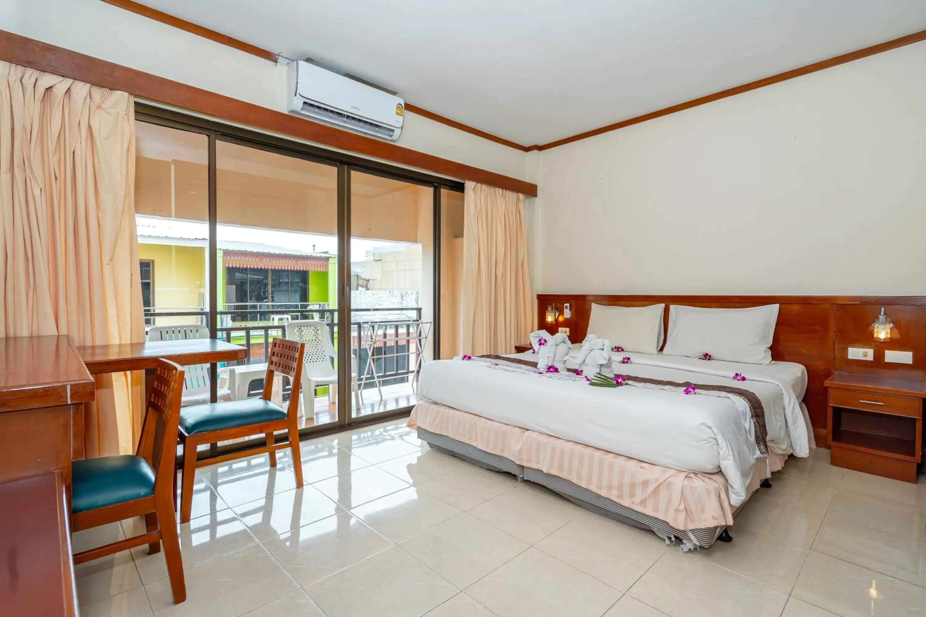 Bed in Outdoor Inn Kata Hotel