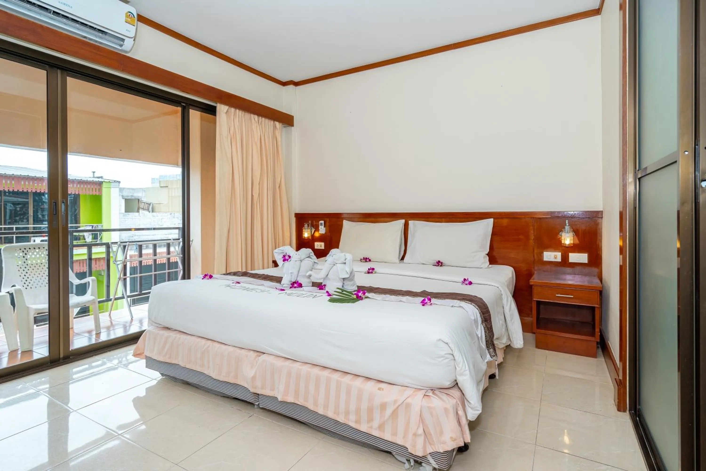 Bed in Outdoor Inn Kata Hotel