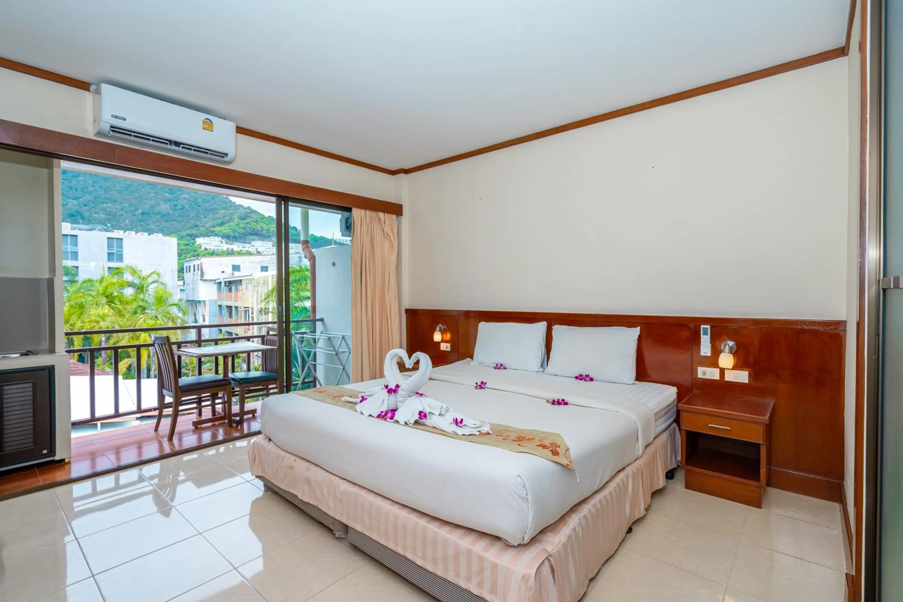 Bed in Outdoor Inn Kata Hotel