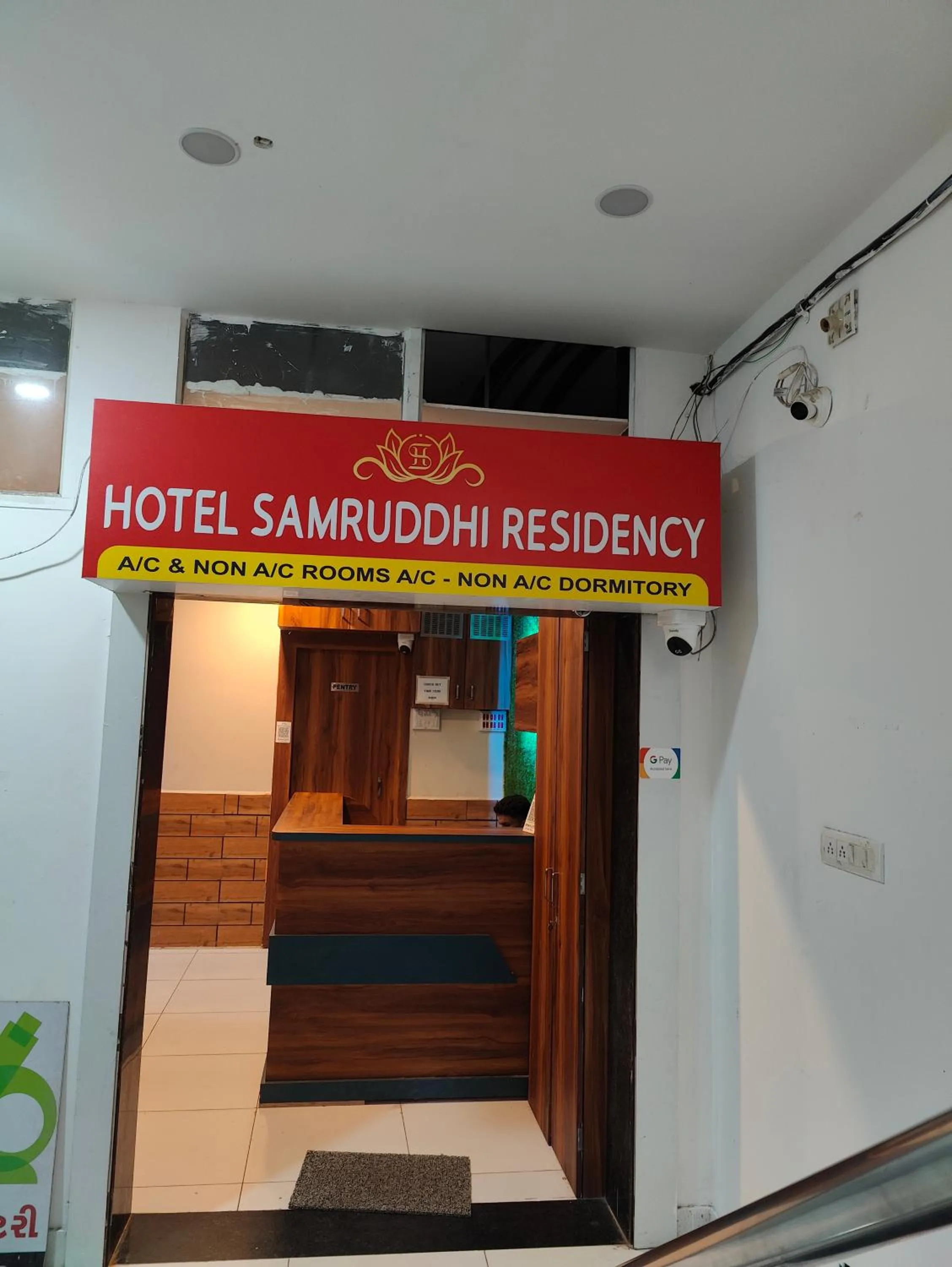 Logo/Certificate/Sign in Hotel Samruddhi Residency
