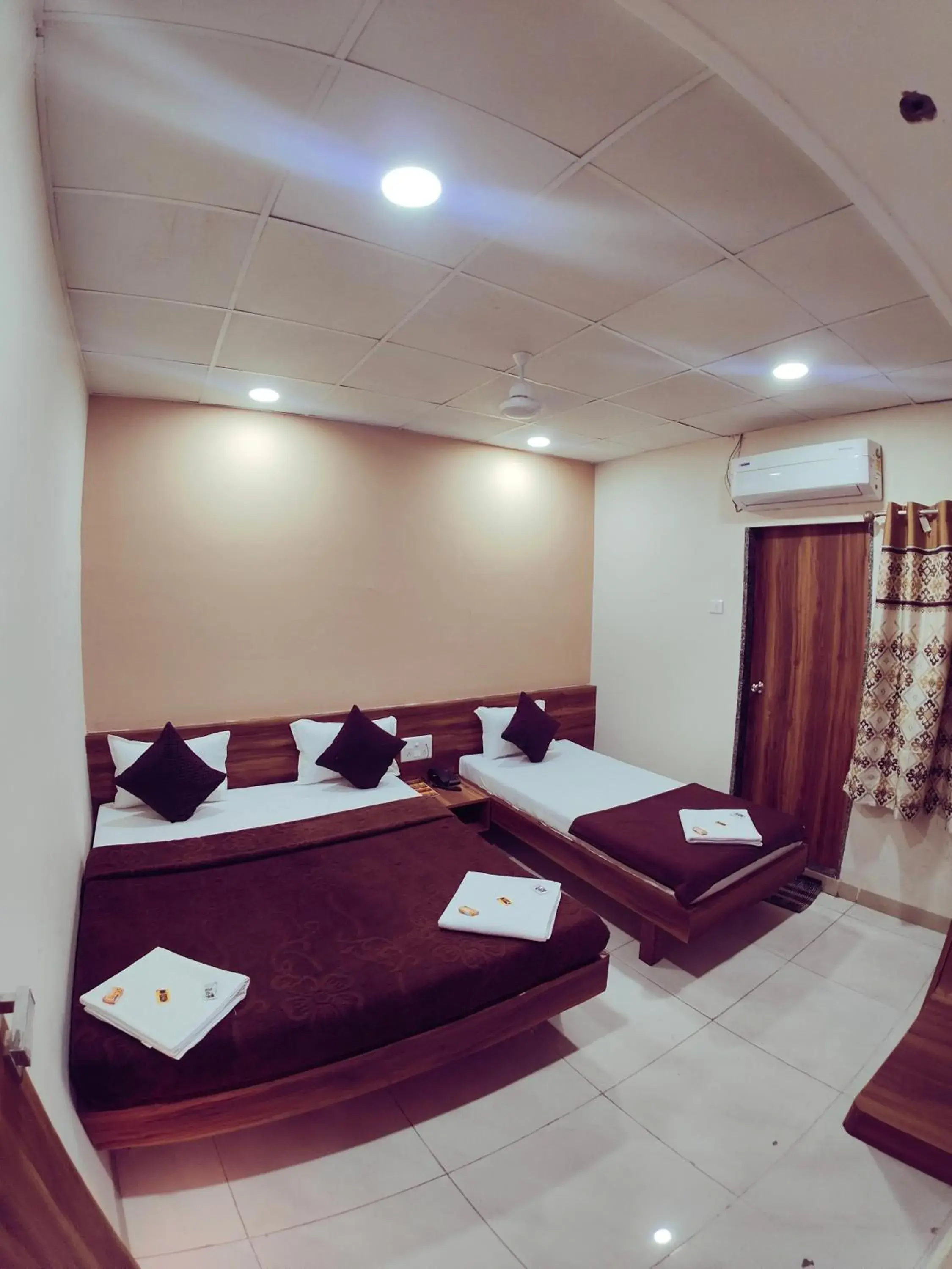 Bedroom, Bed in Hotel Samruddhi Residency Bedroom, Bed in Hotel Samruddhi Residency