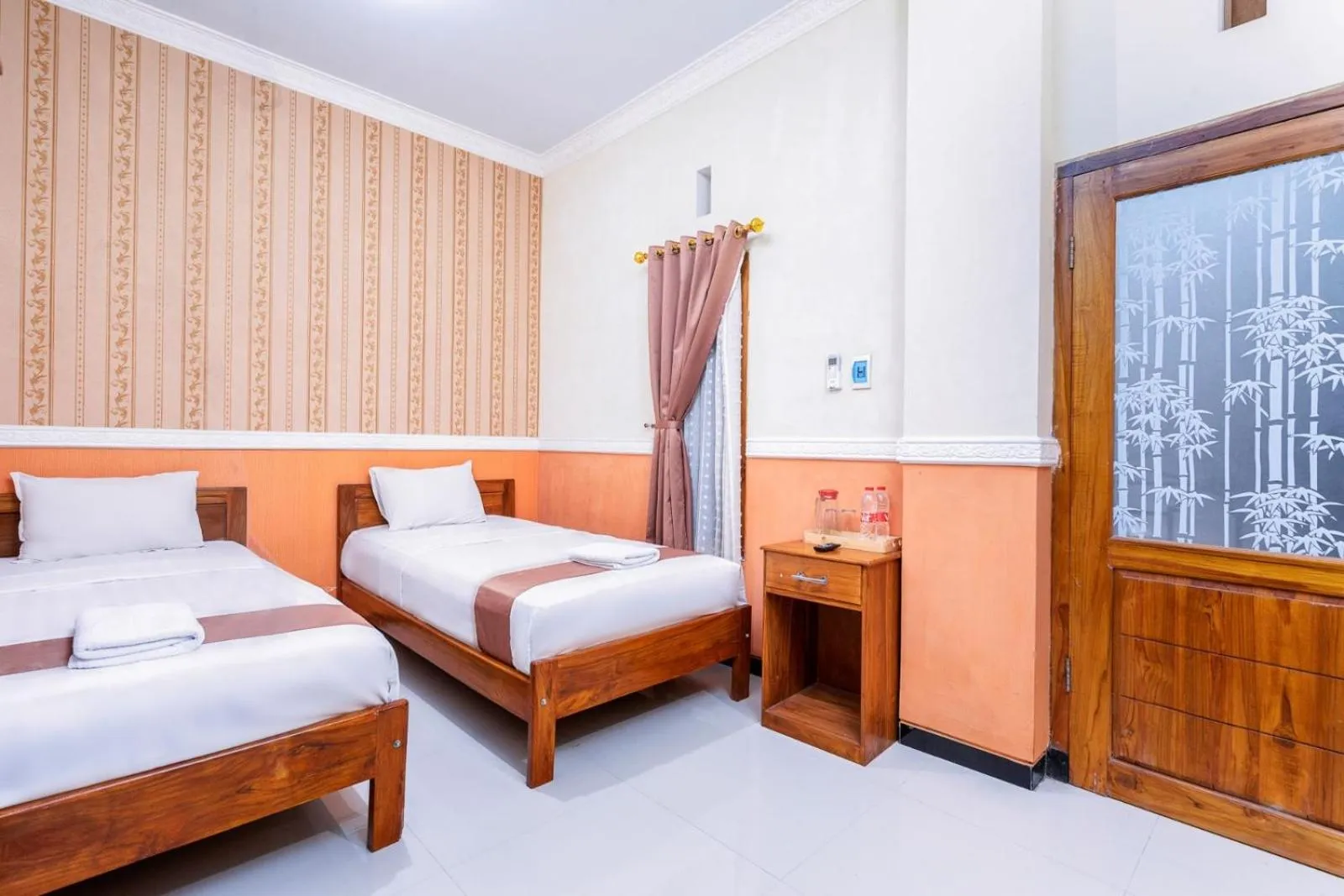 Bed in Grand Valonia Hotel Cafe & Park Jember