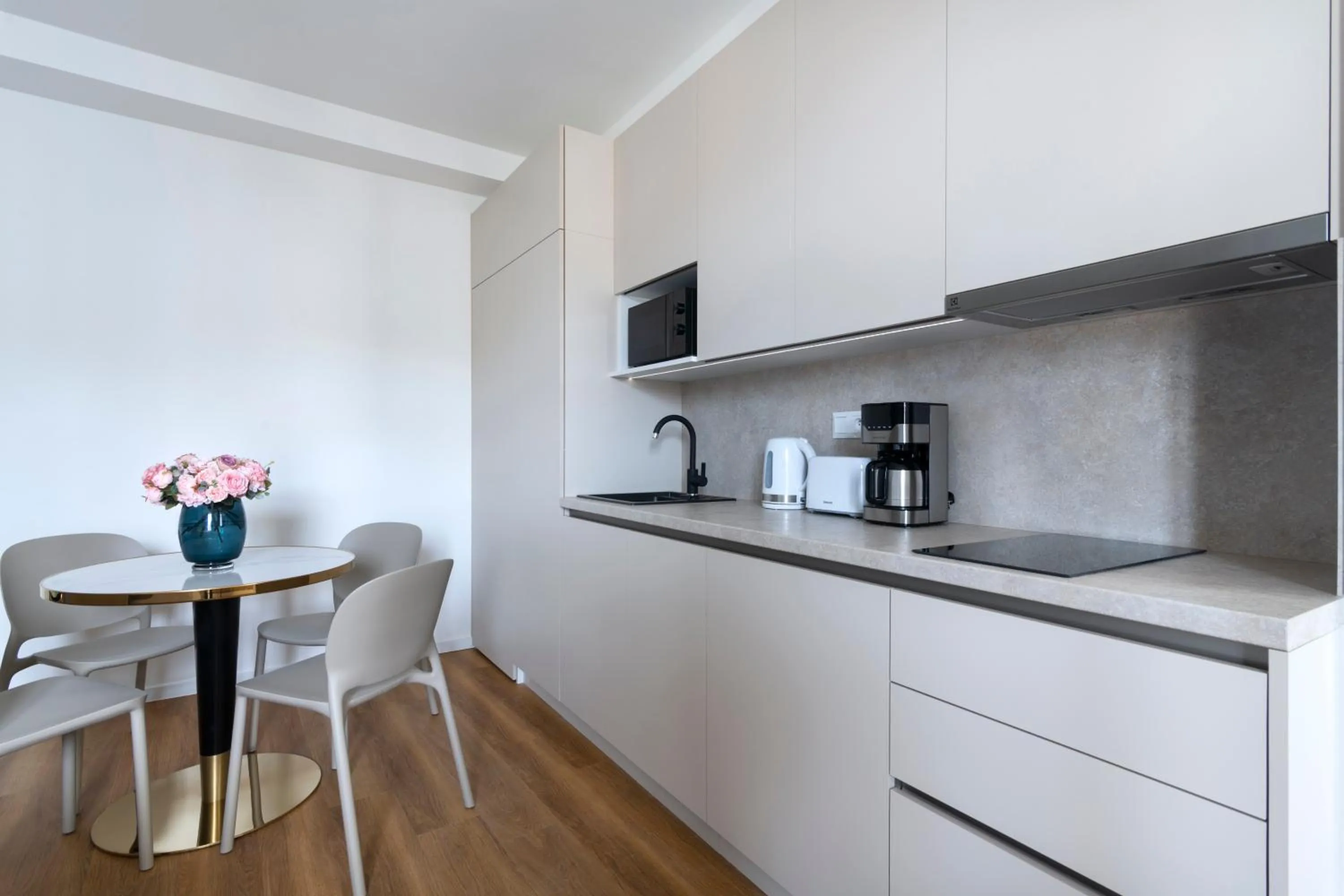 Kitchen or kitchenette in Encore Boutique Residence by Dwellfort