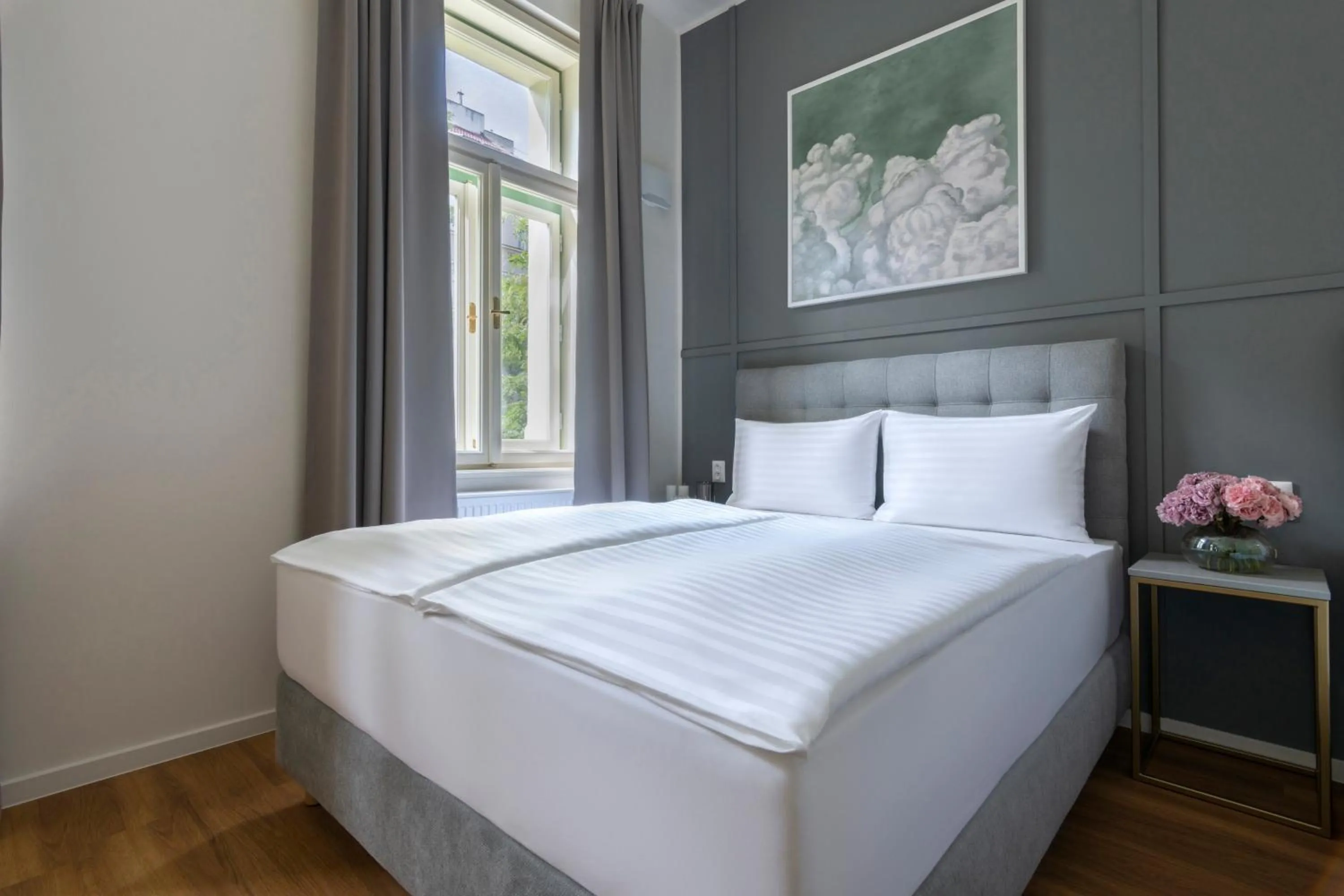 Bed in Encore Boutique Residence by Dwellfort