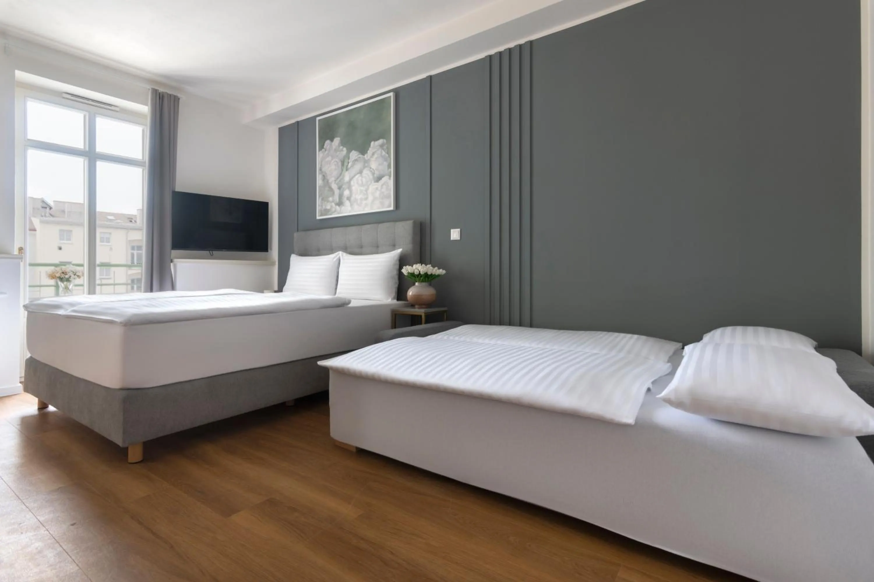 Bed in Encore Boutique Residence by Dwellfort