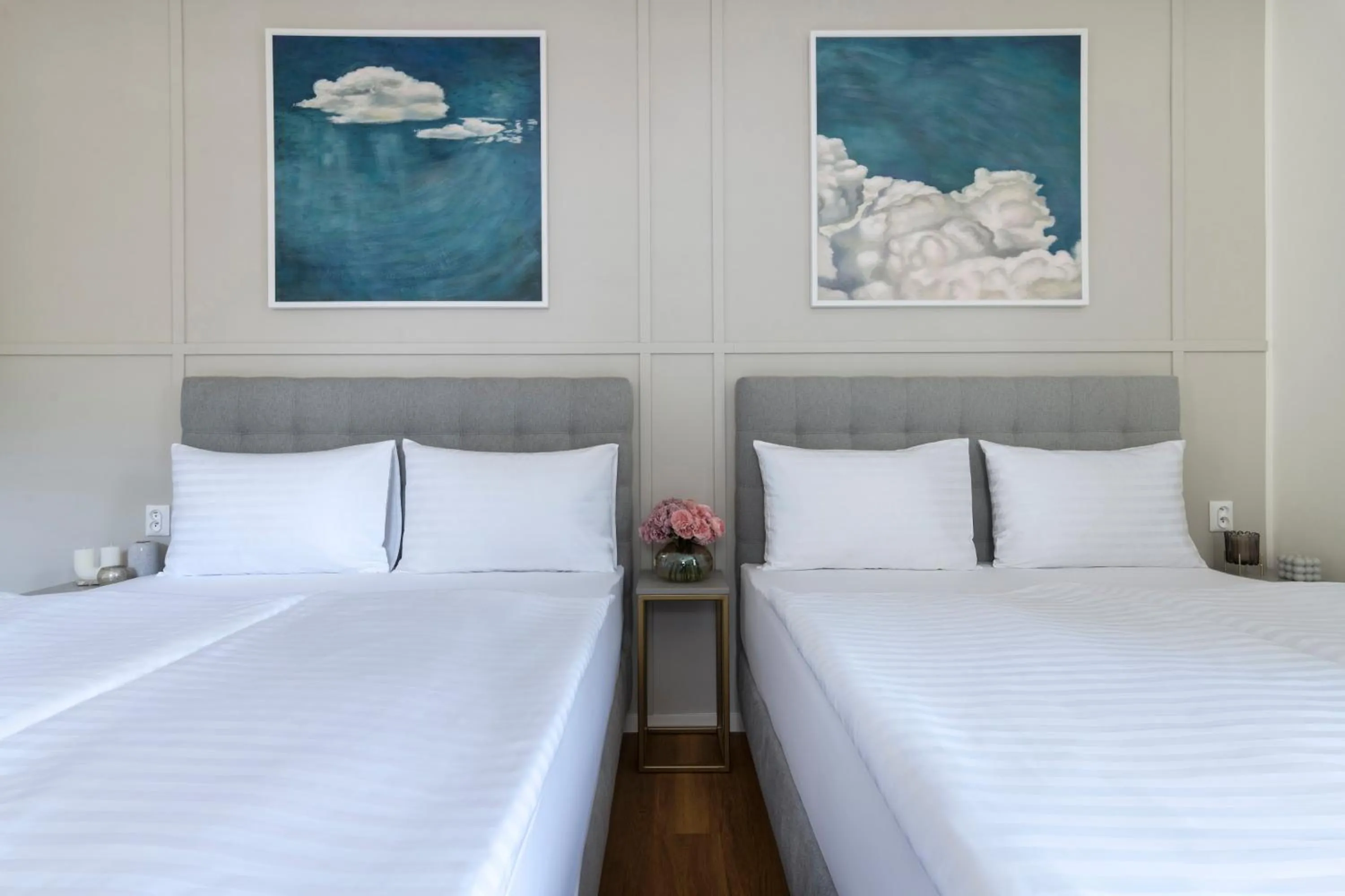 Bed in Encore Boutique Residence by Dwellfort