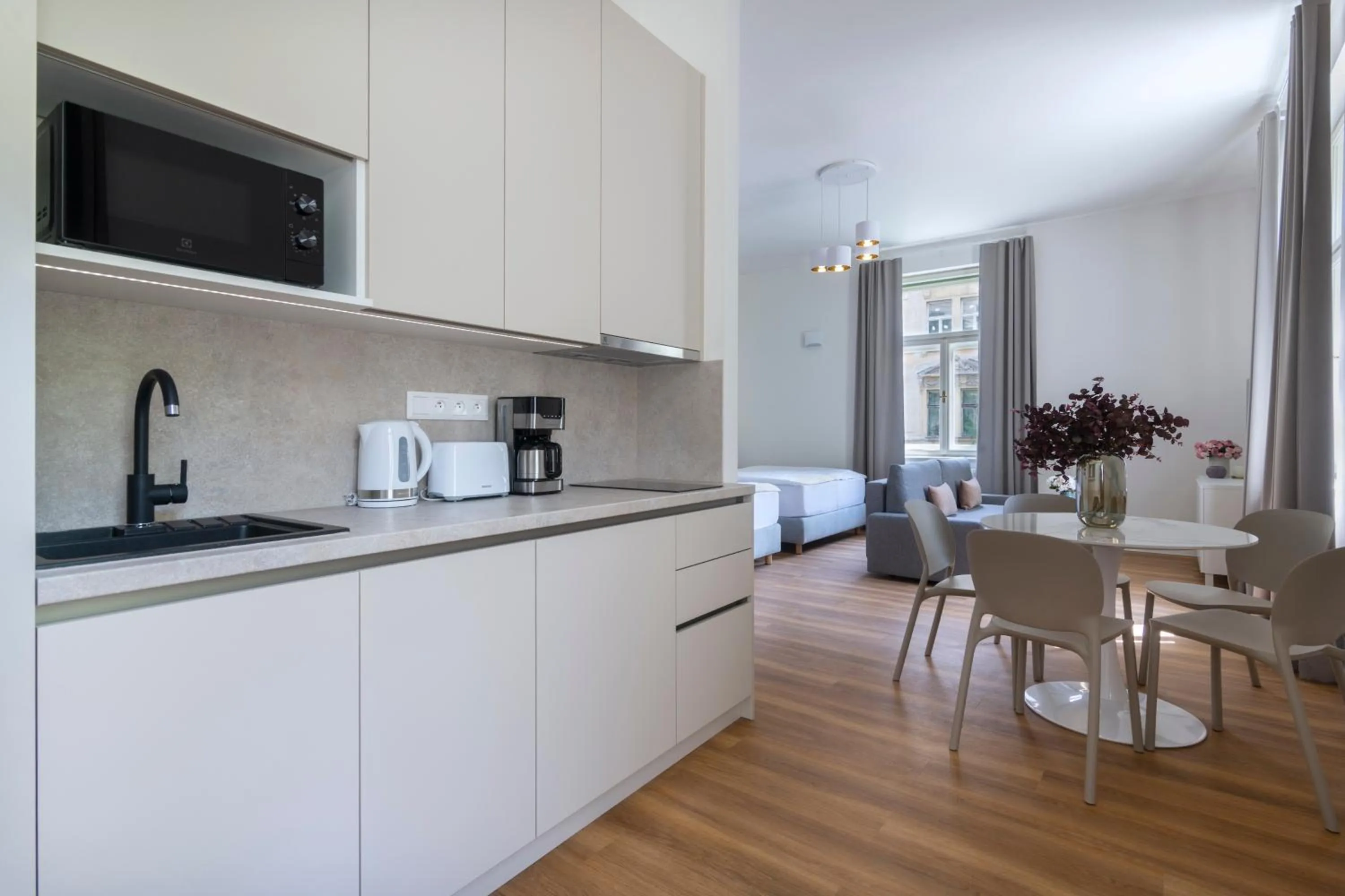 kitchen in Encore Boutique Residence by Dwellfort