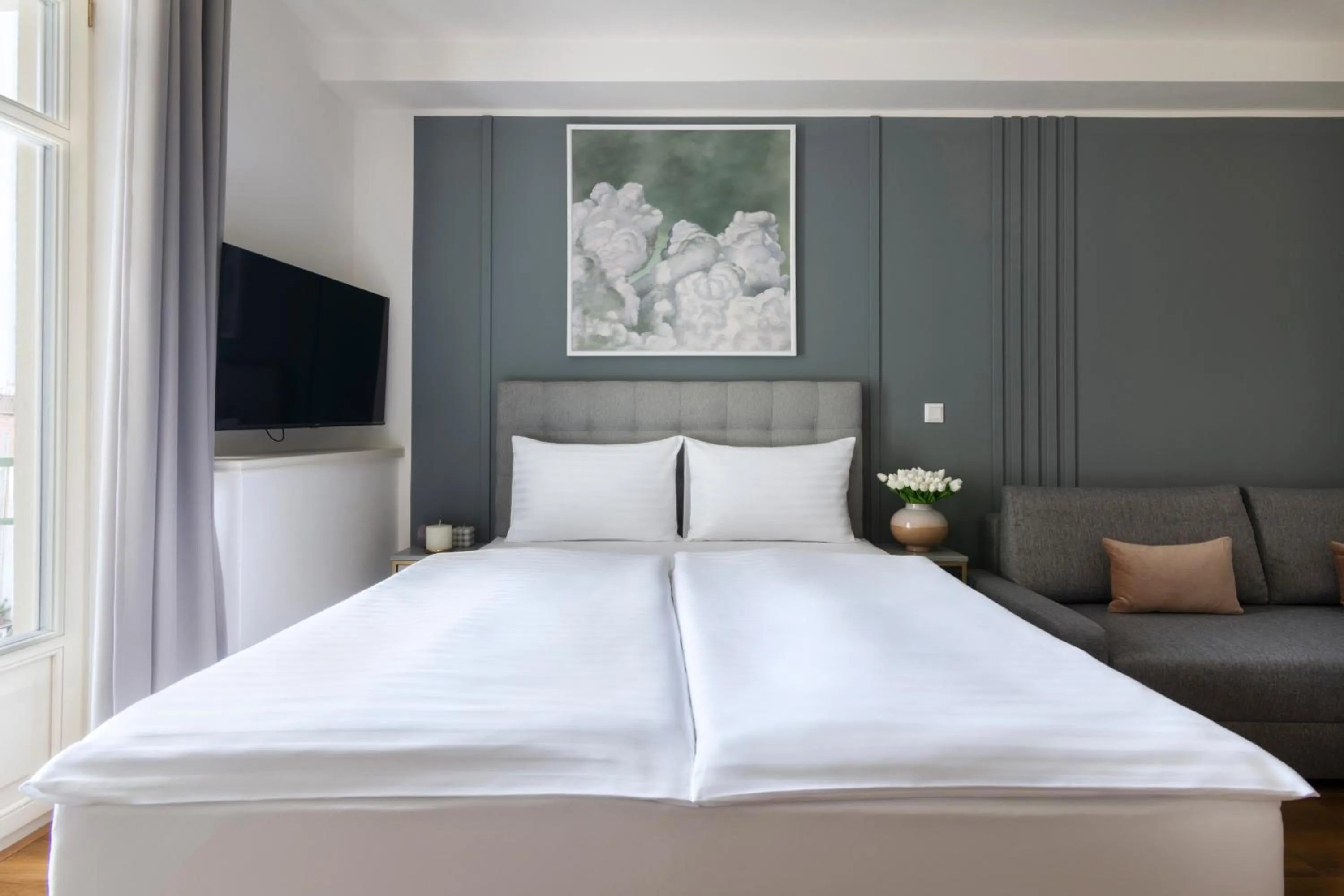 Bed in Encore Boutique Residence by Dwellfort