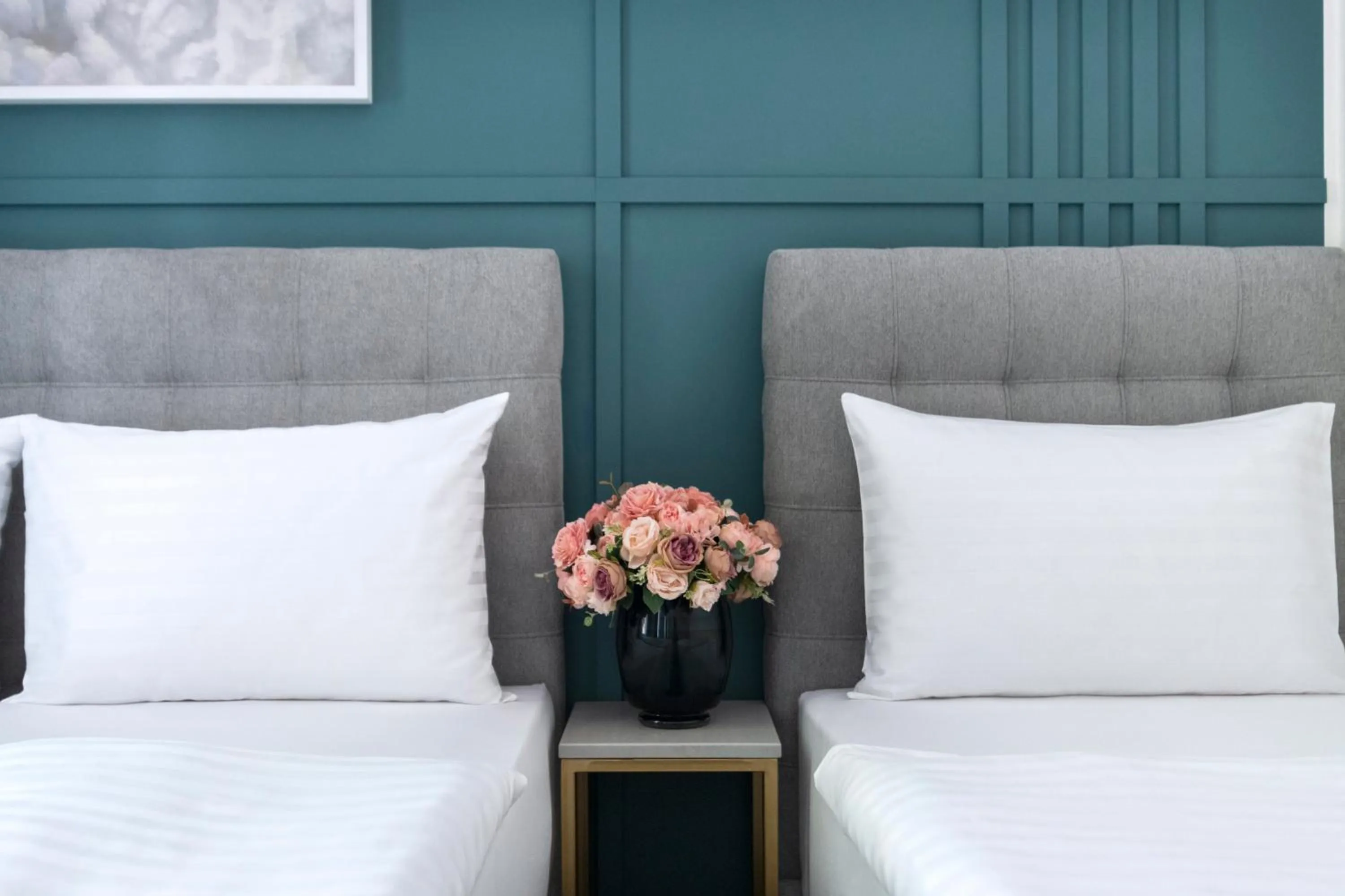 Bed in Encore Boutique Residence by Dwellfort