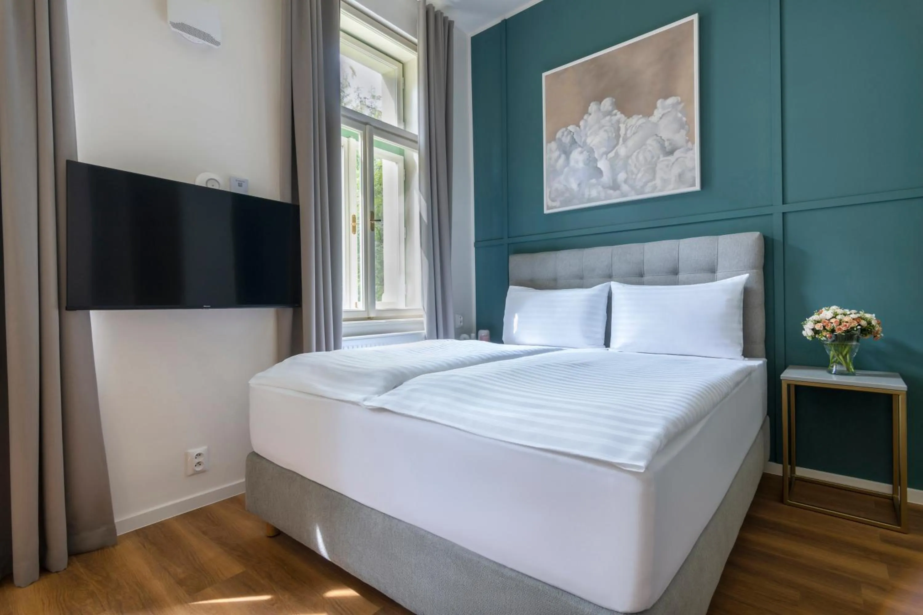 Bed in Encore Boutique Residence by Dwellfort