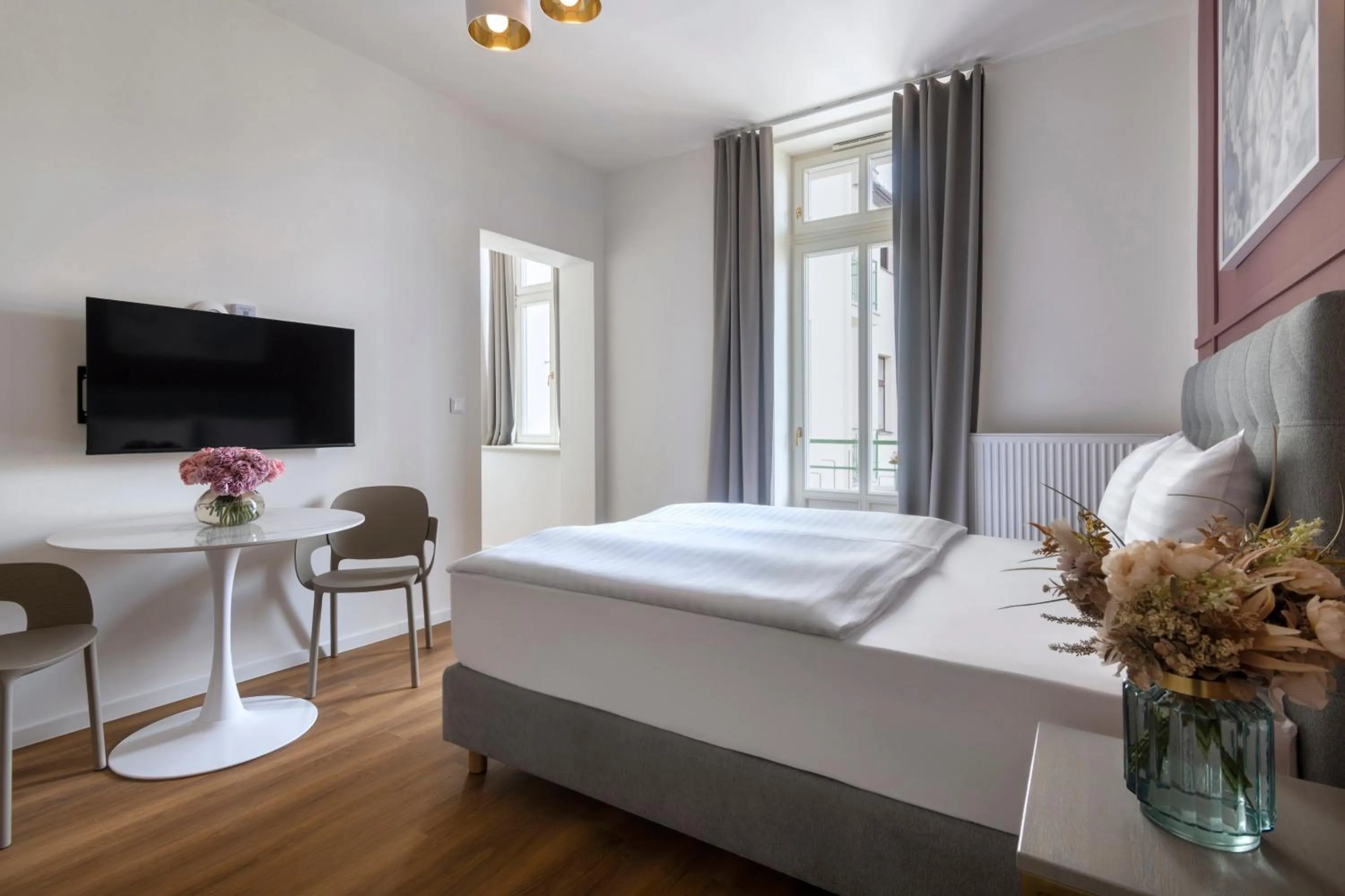 Bed in Encore Boutique Residence by Dwellfort