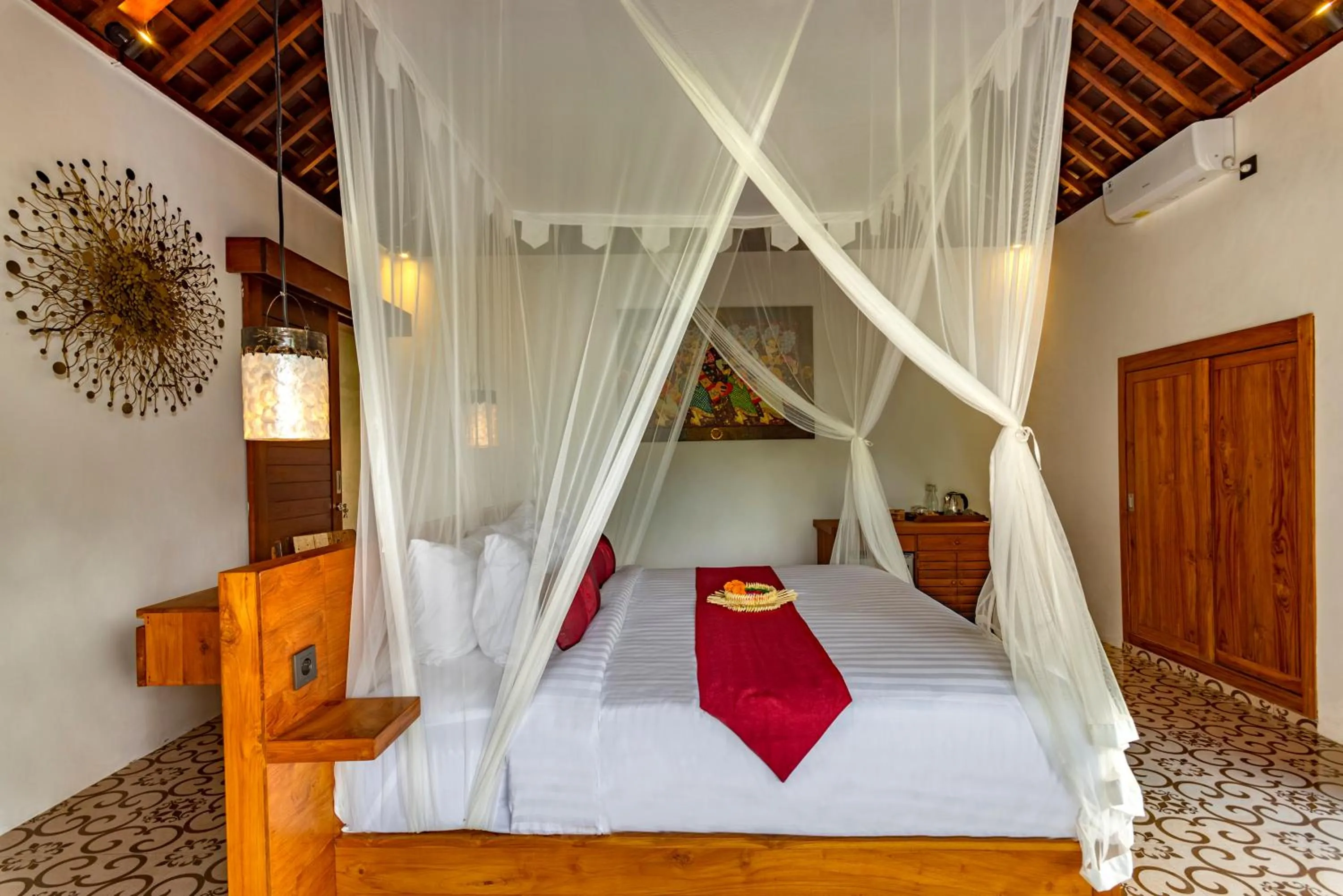 Bed in Tiare Villa Ubud by Dhananjaya Hospitality