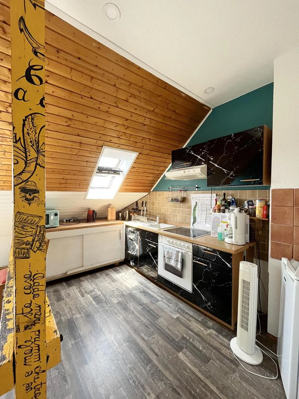 Kitchen or kitchenette in Homeplanet Hostel