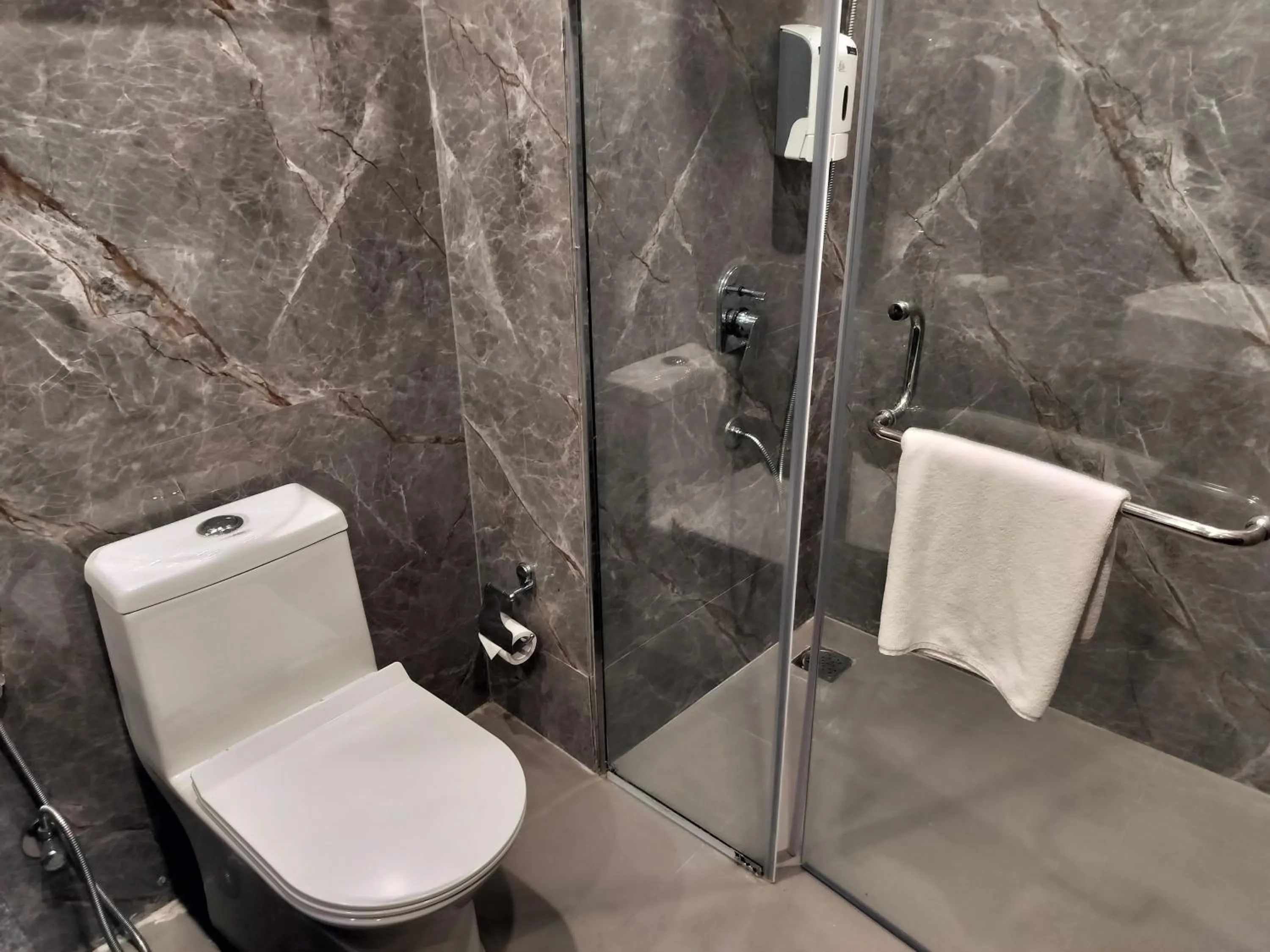 Shower in Bel-La Monde Hotel NH8 at 6km from IGI Airport Delhi