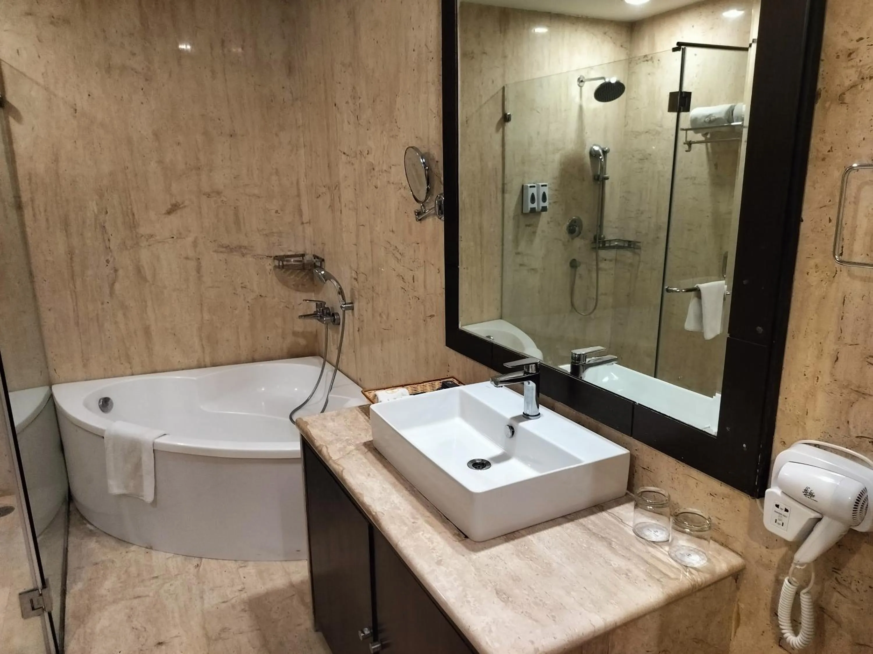 Bathroom in Bel-La Monde Hotel NH8 at 6km from IGI Airport Delhi